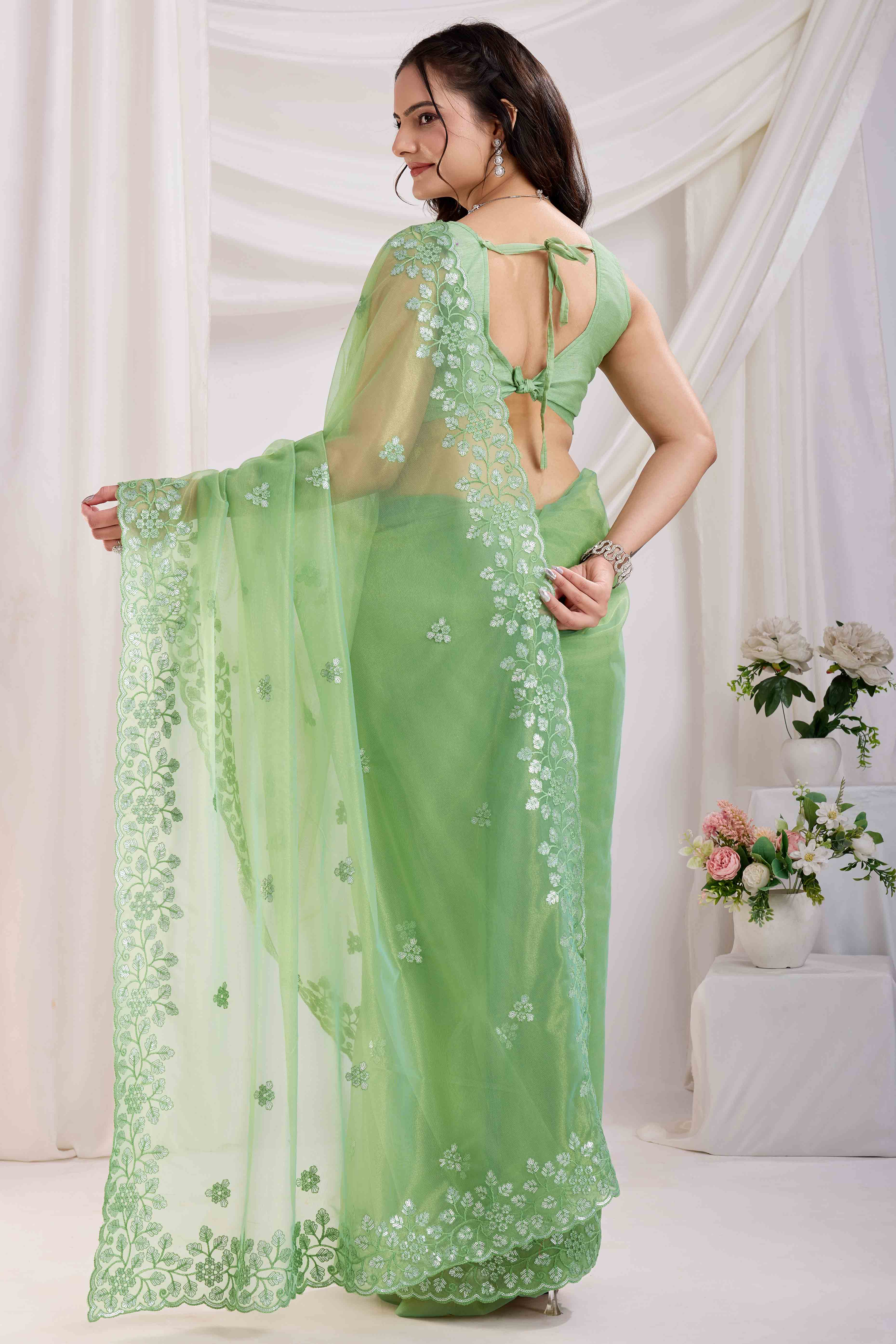 Green Floral Sequins Embroidered Twill Net Saree