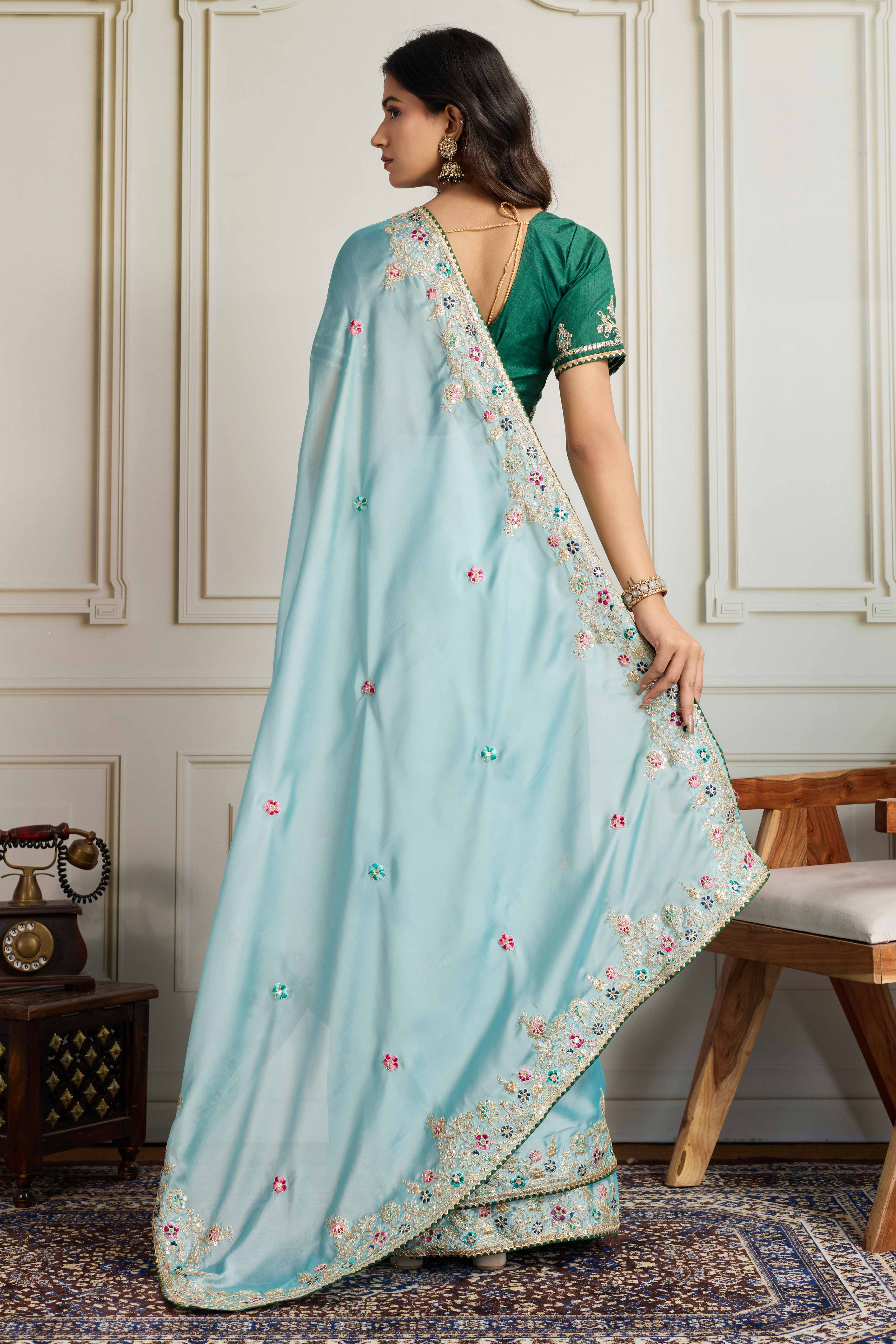 Aqua Blue Star Georgette Party Saree with Sequins and Floral Embroidery