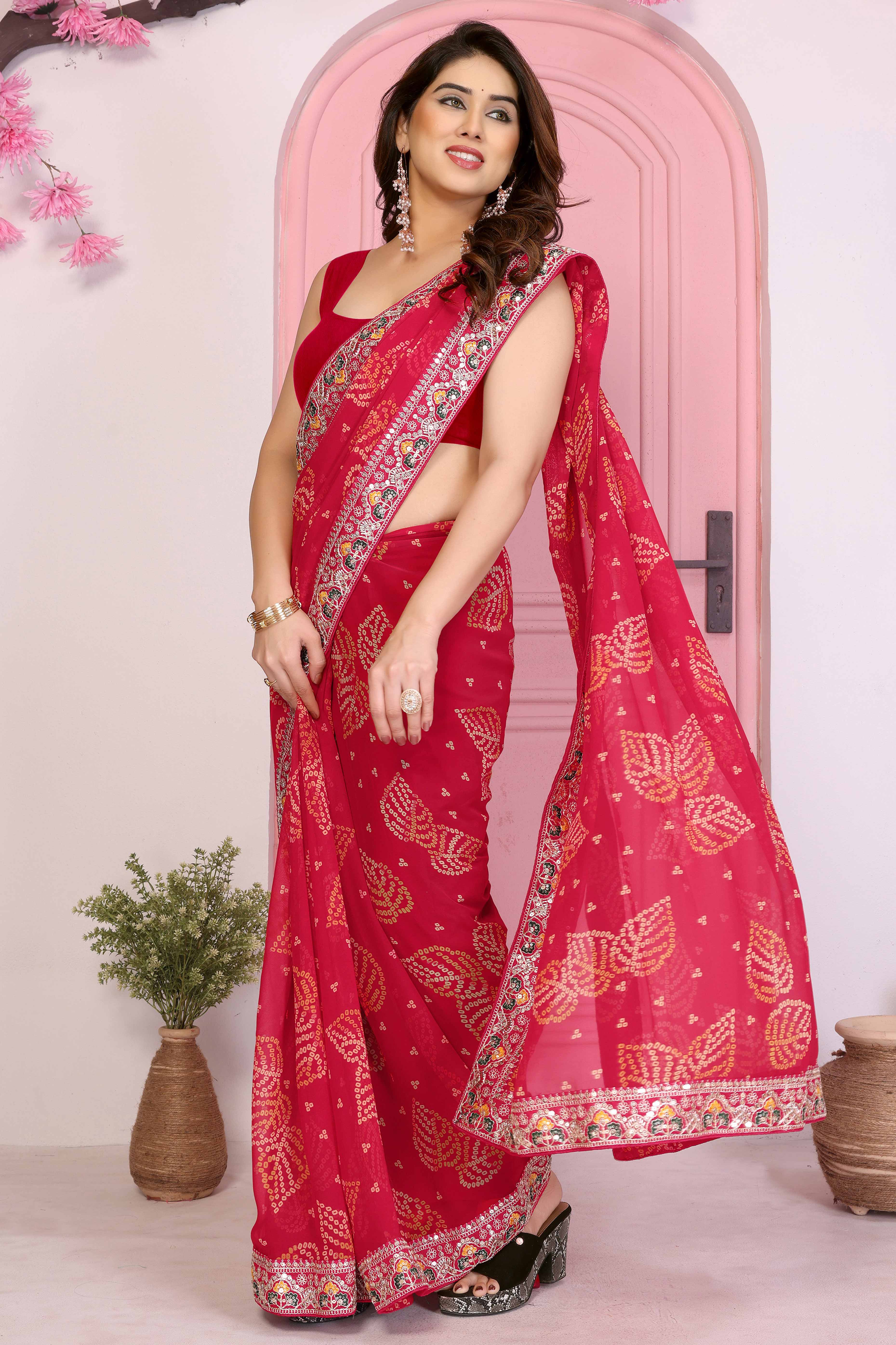 Pink Georgette Saree with Traditional Bandhani Print and Lace Accents