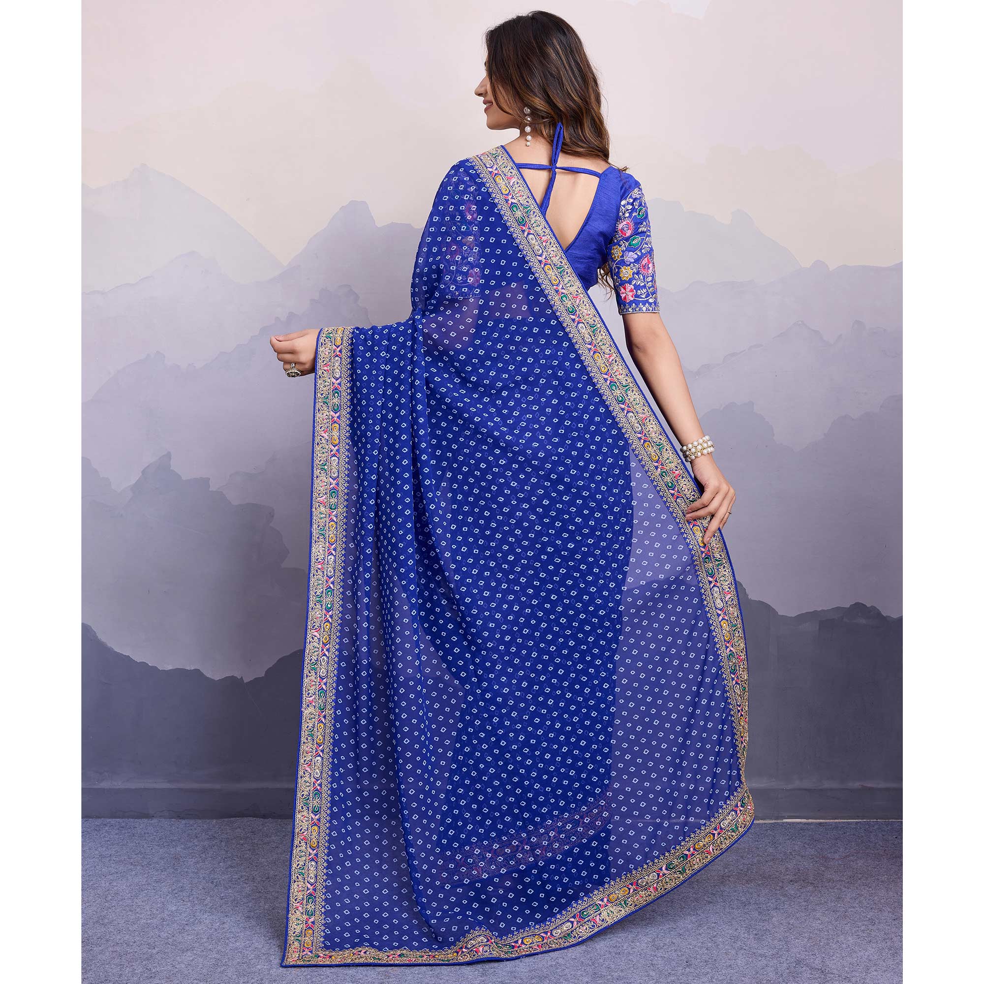 Blue Bandhani Printed Georgette Saree With Embroidered Lace Border