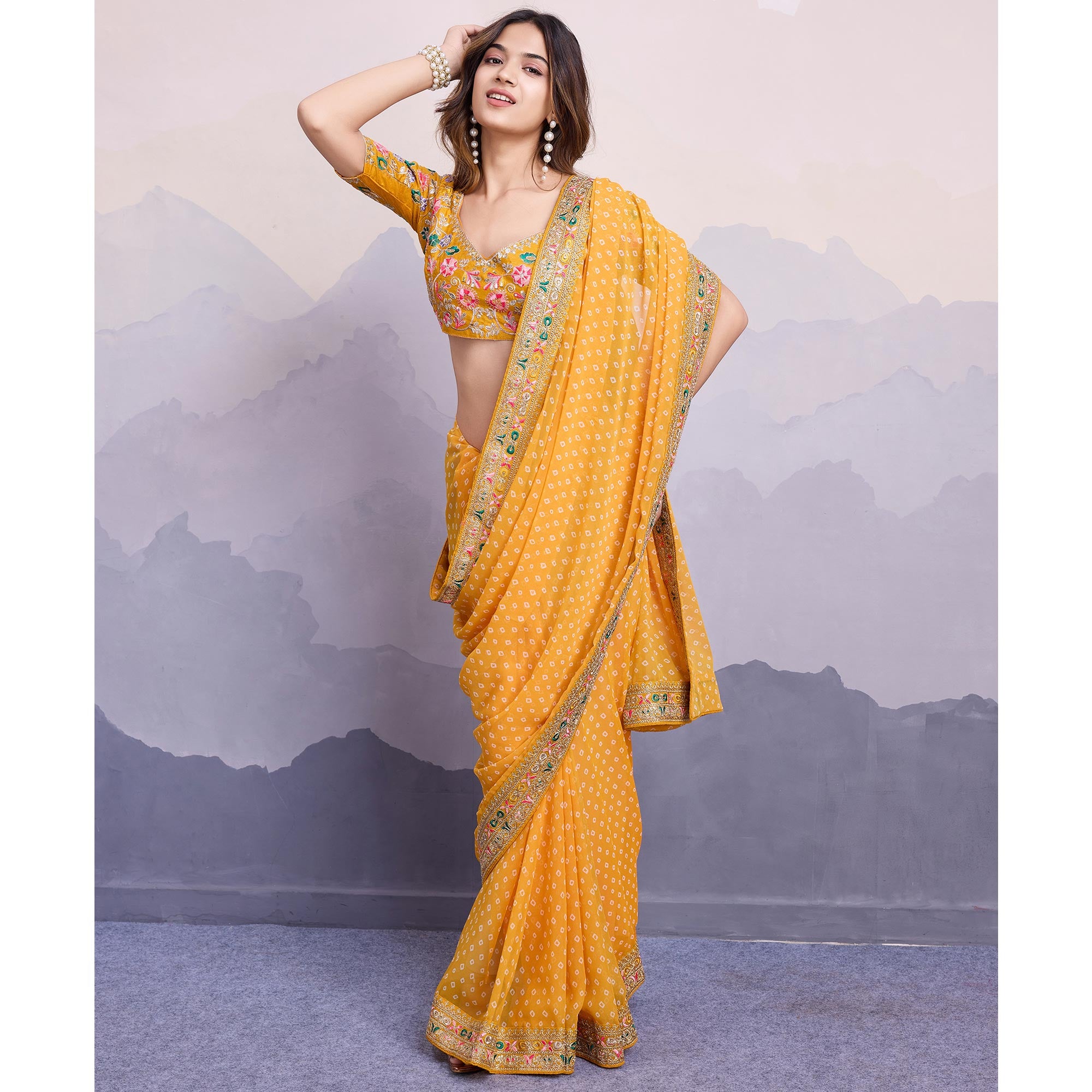 Yellow Bandhani Printed Georgette Saree With Embroidered Lace Border