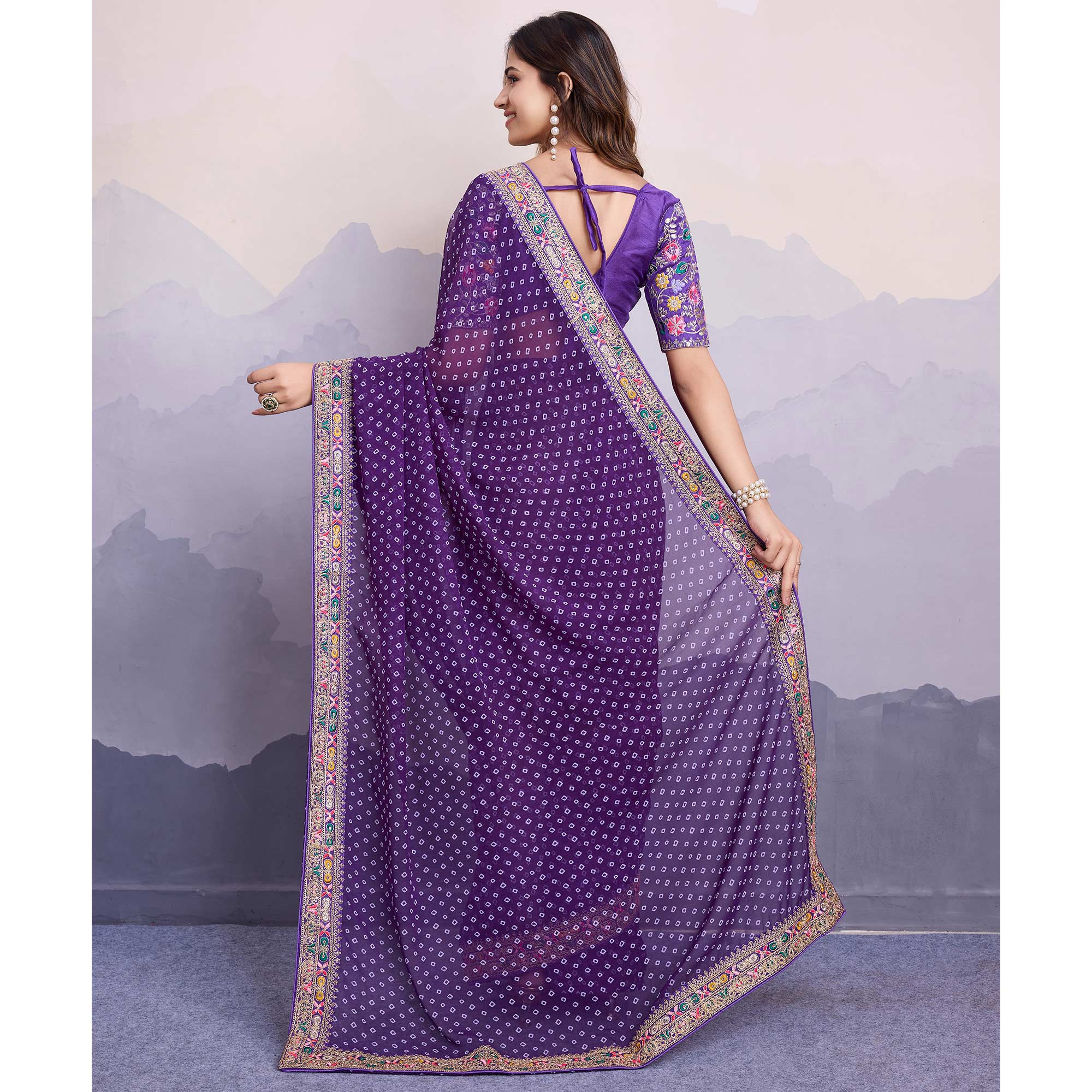 Purple Bandhani Printed Georgette Saree With Embroidered Lace Border