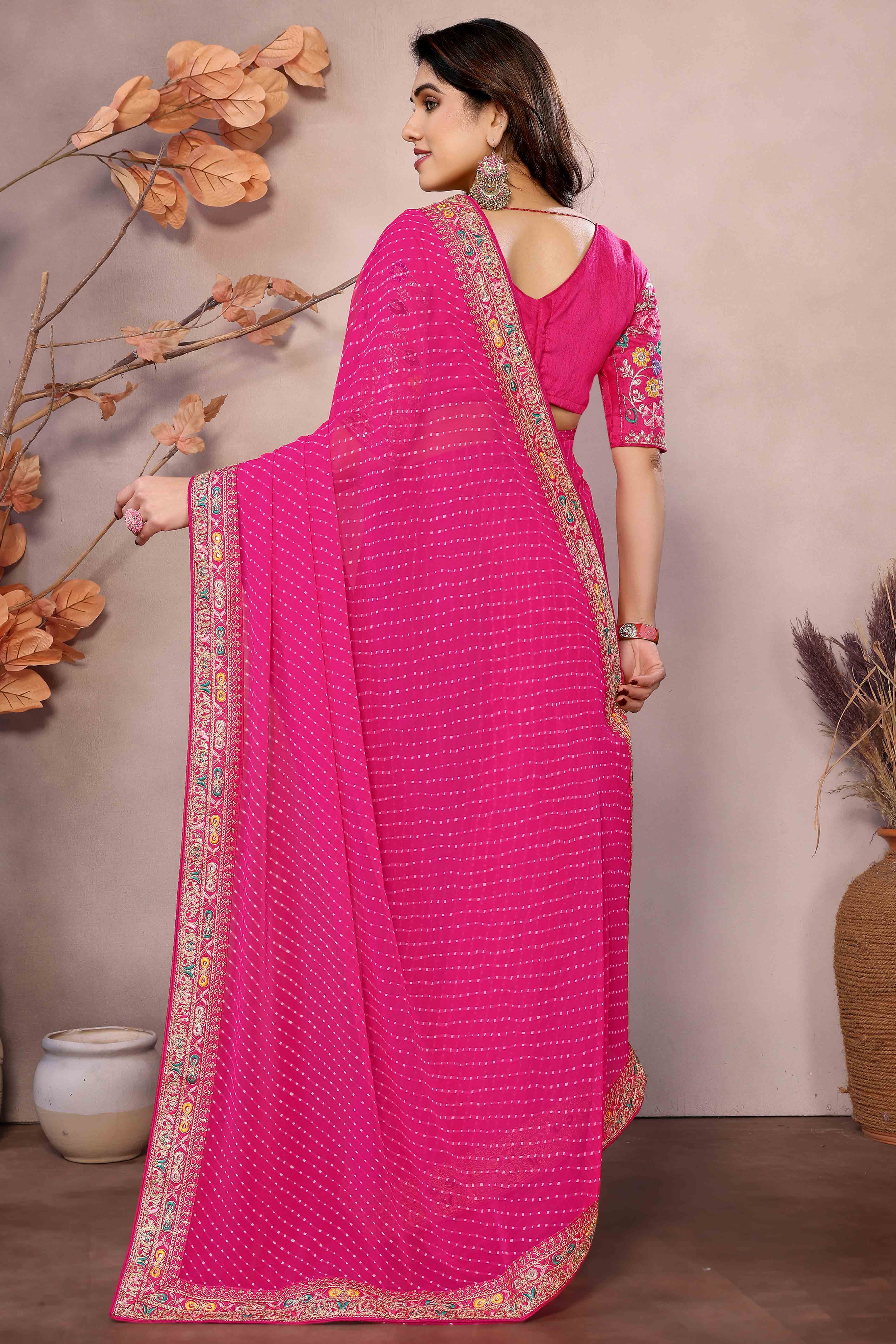 Pink Striped Printed Georgette Saree With Glittering Sequin Cording Embroidered Border