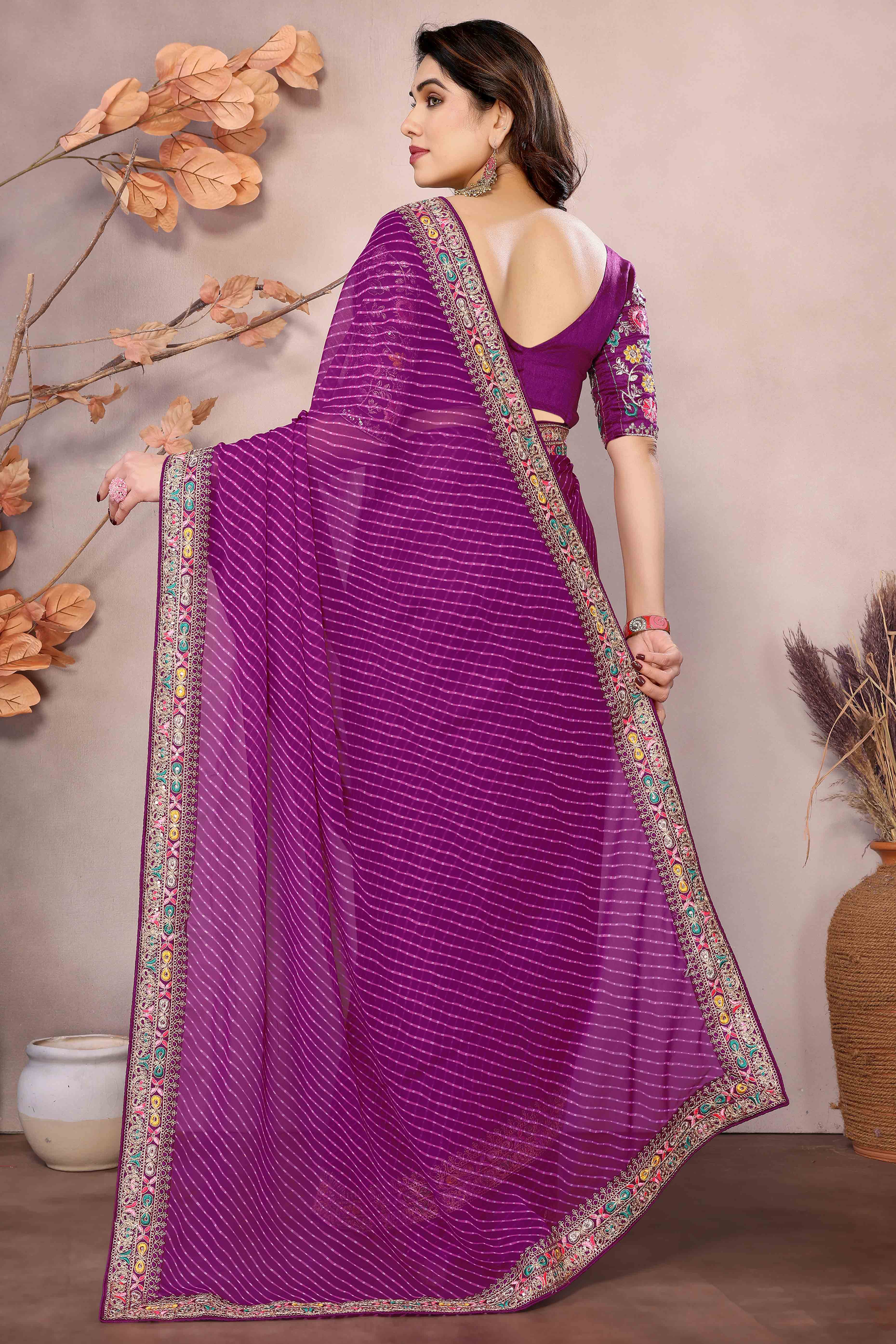 Purple Striped Printed Georgette Saree With Glittering Sequin Cording Embroidered Border