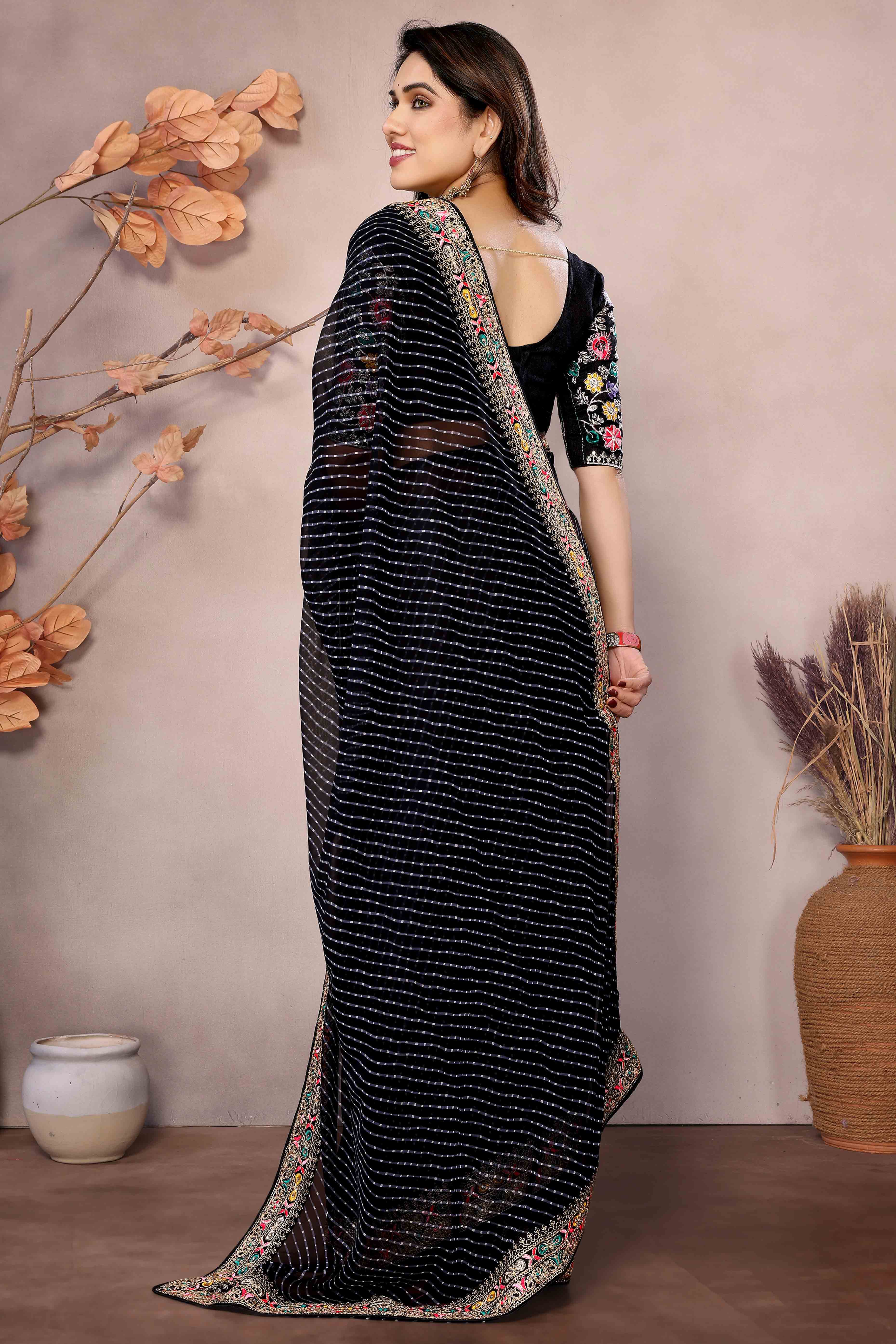 Black Striped Printed Georgette Saree With Glittering Sequin Cording Embroidered Border