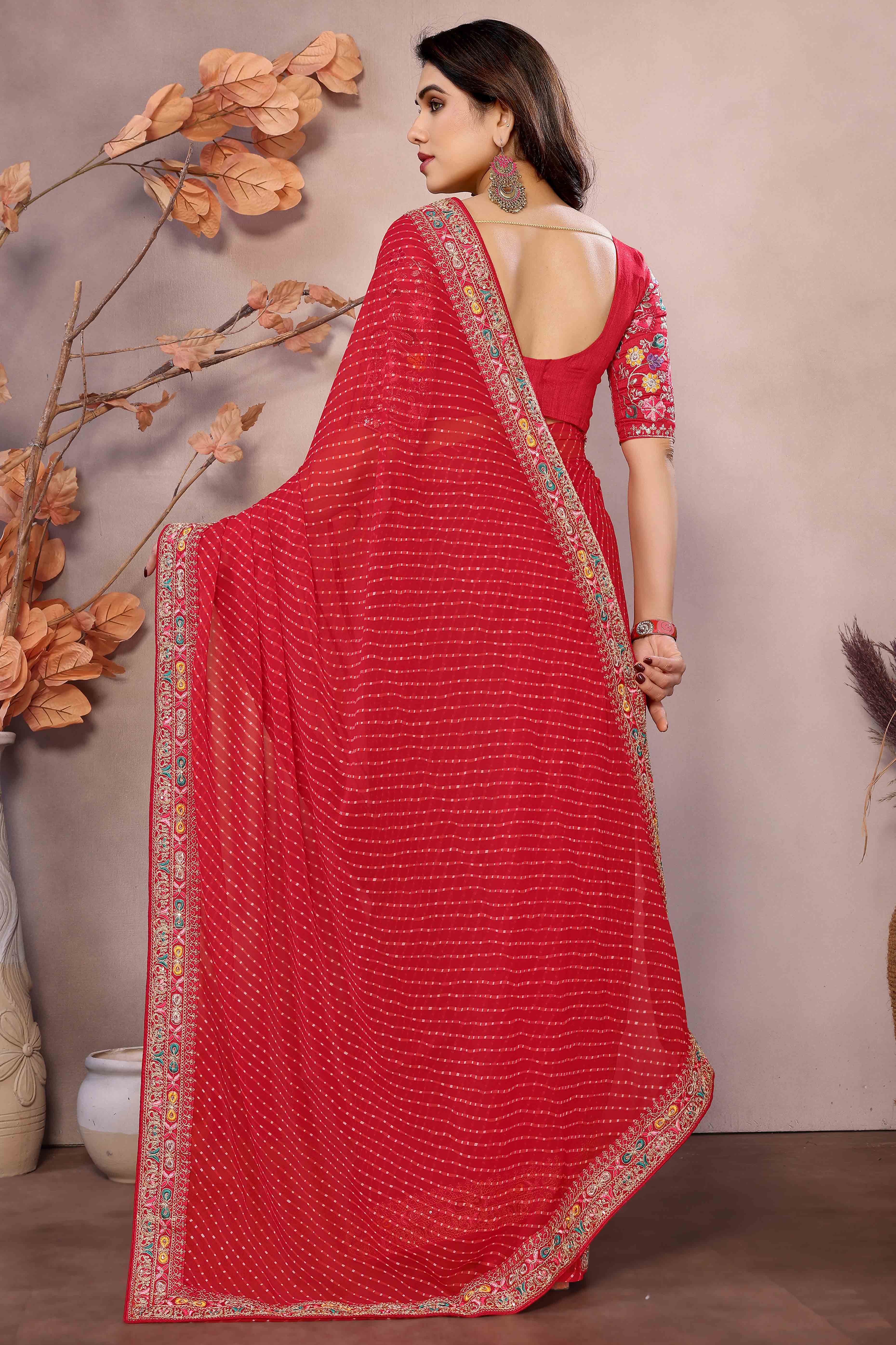 Red Striped Printed Georgette Saree With Glittering Sequin Cording Embroidered Border