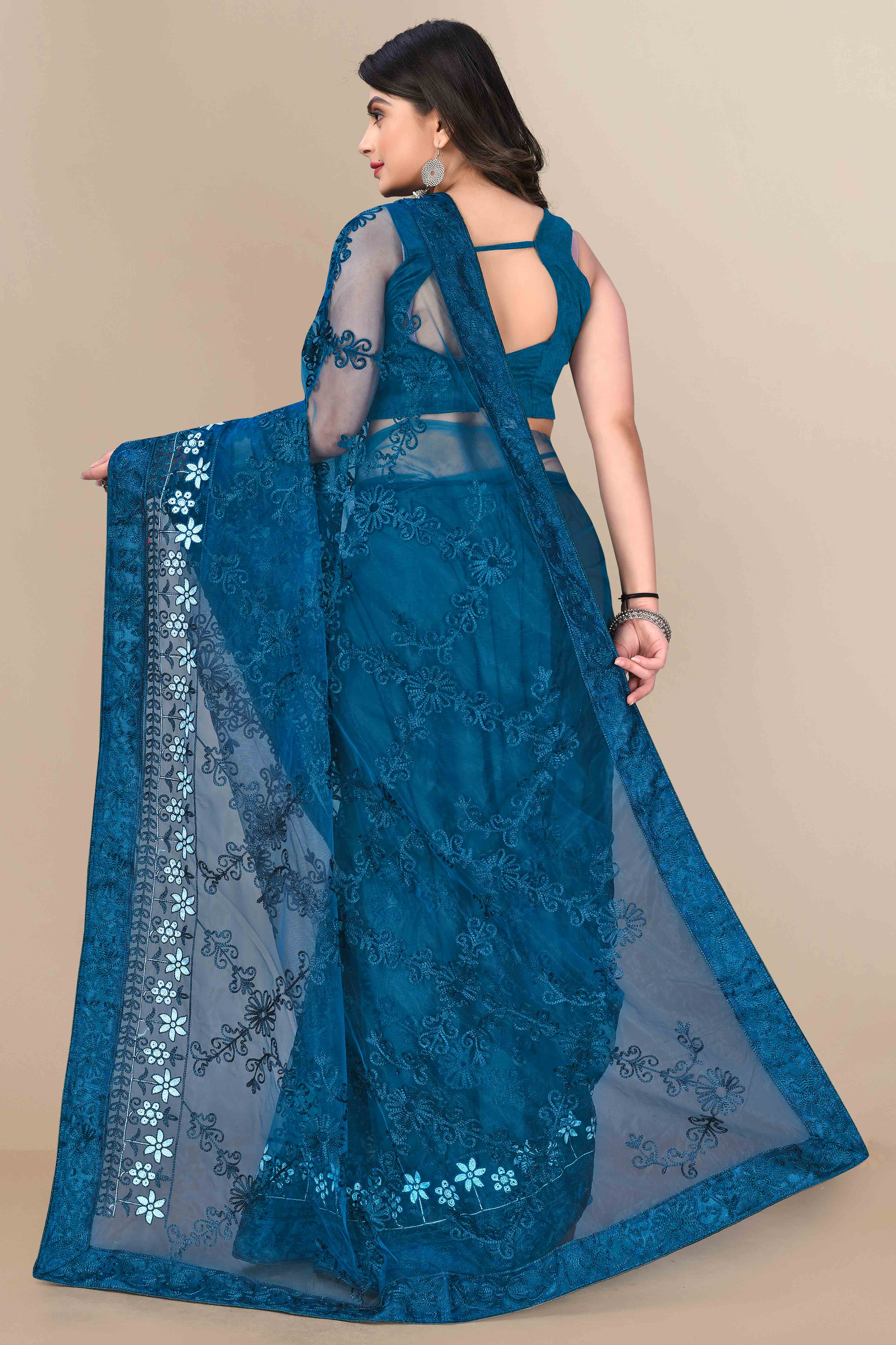 Teal Party Wear Net Saree Featuring Rich Floral Embroidery