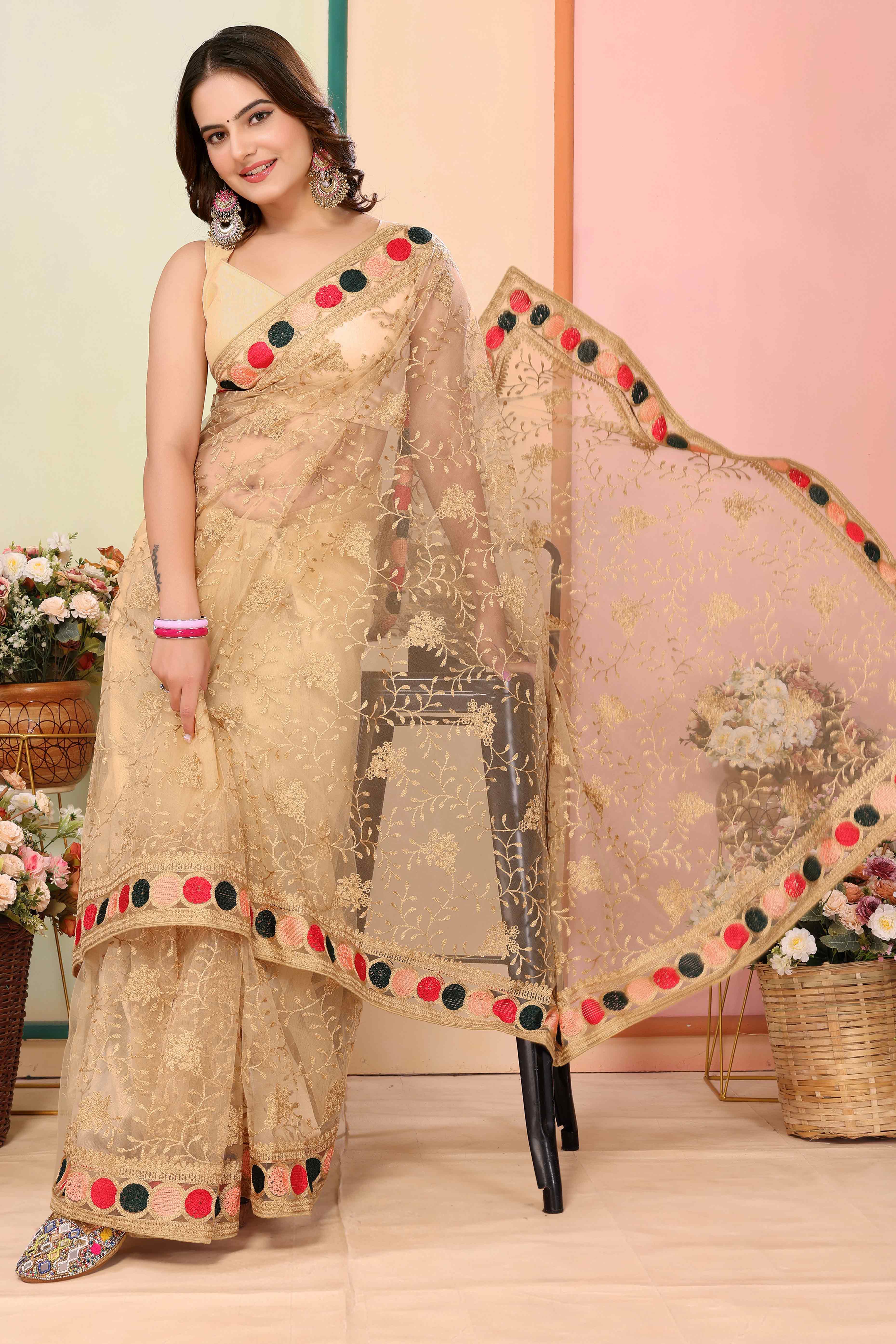 Chikoo Floral Embroidered Net Saree