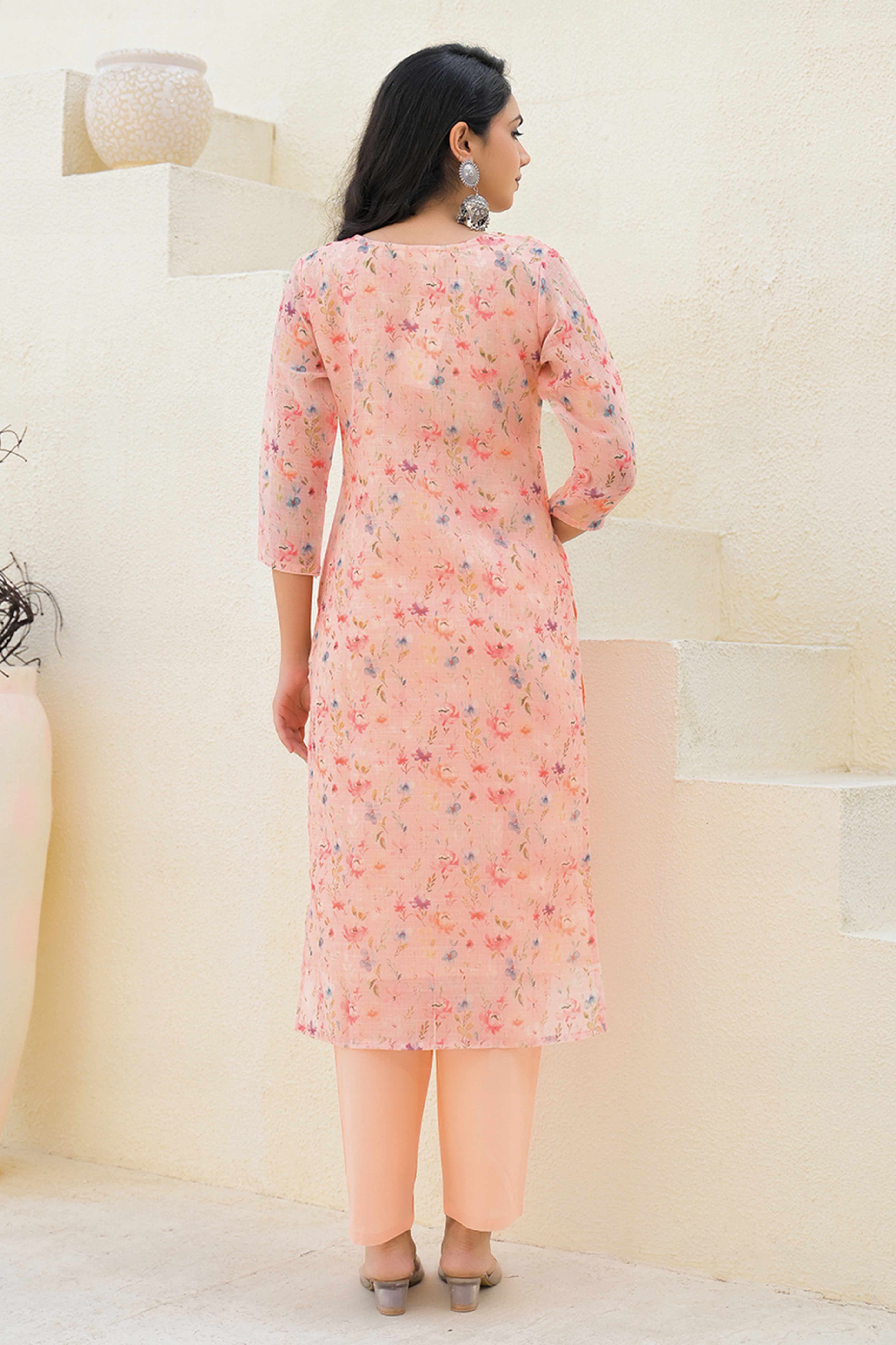 Graceful Peach Floral Printed Suit in Linen with Delicate Chikankari Embroidery