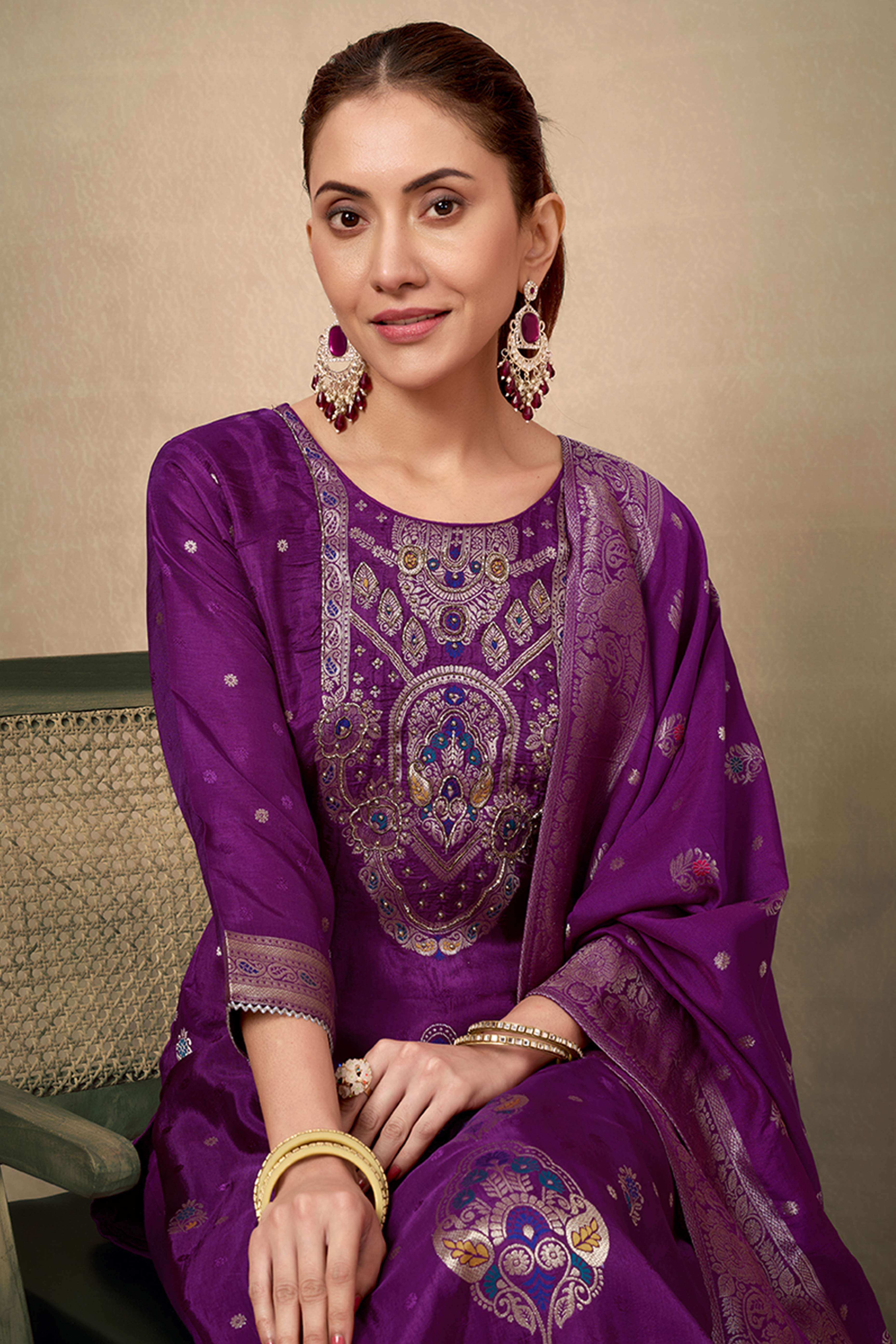 Wine Colored Viscose Jacquard Silk Straight Salwar Suit With Zari Weaving And Stone Work.