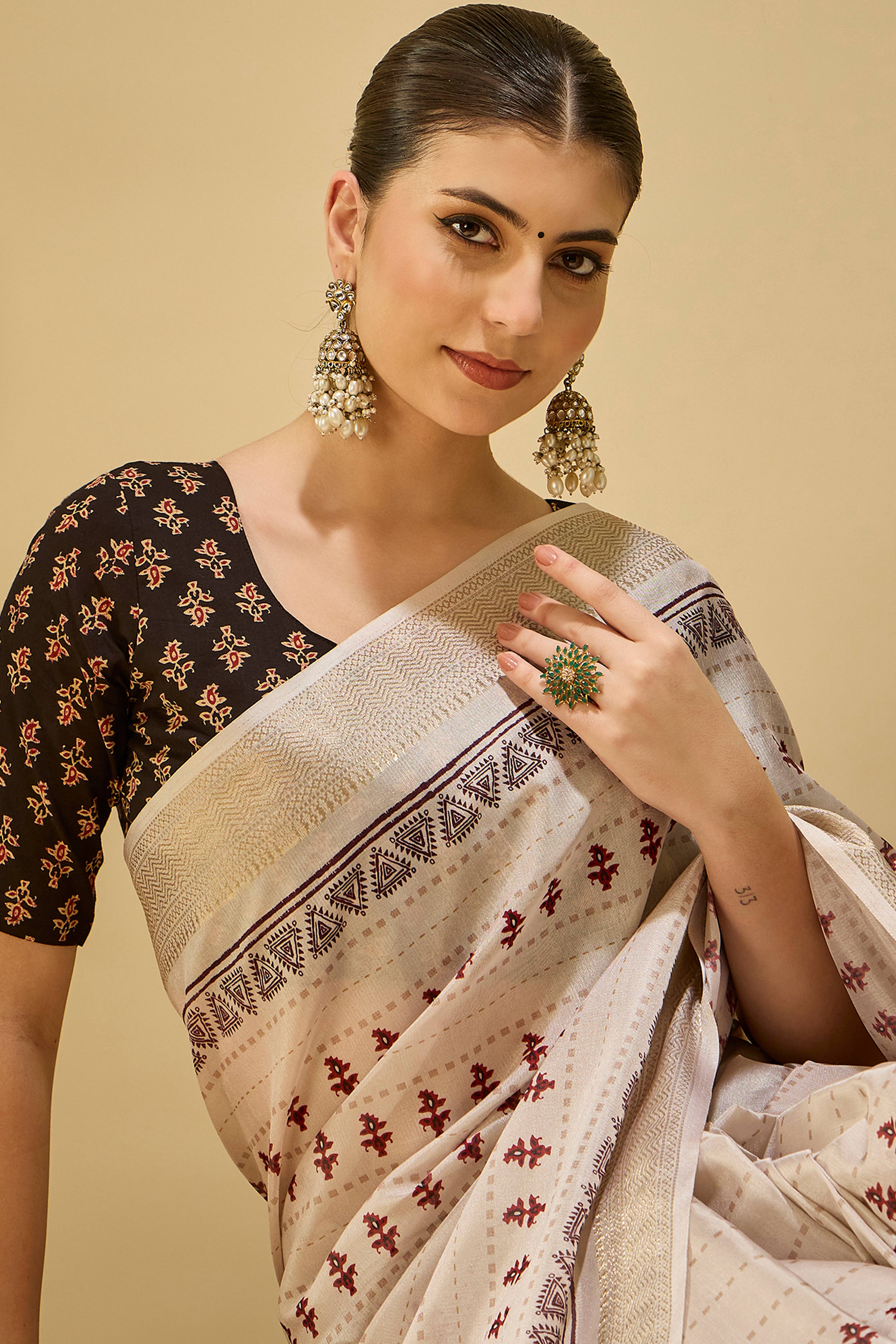 Elegant Cream Katki Cotton Silk Saree With Delicate Floral Prints & Tassel Pallu