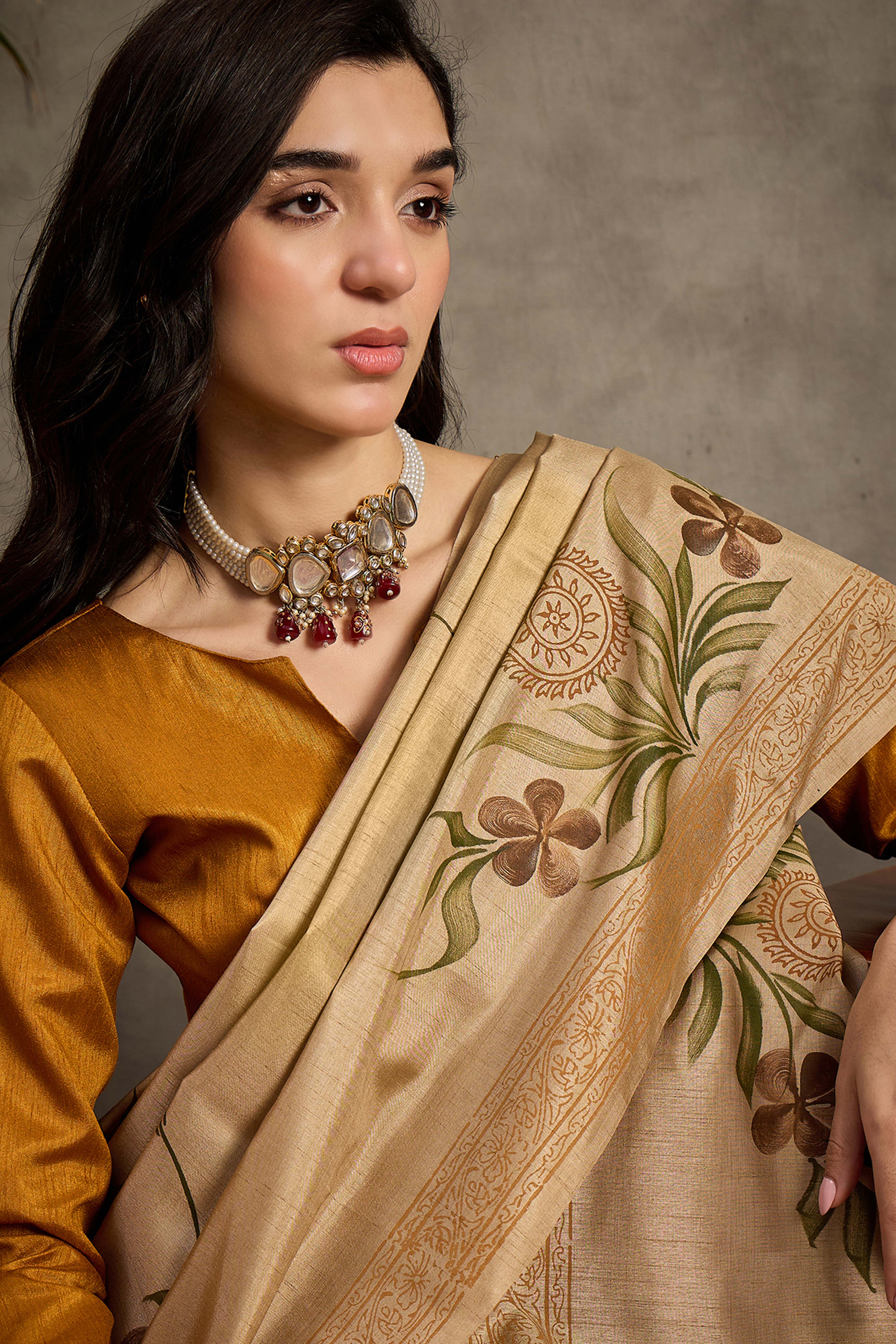 Elegant Beige Floral Print Kozi Cotton Silk Saree Accented With Graceful Tassel Pallu