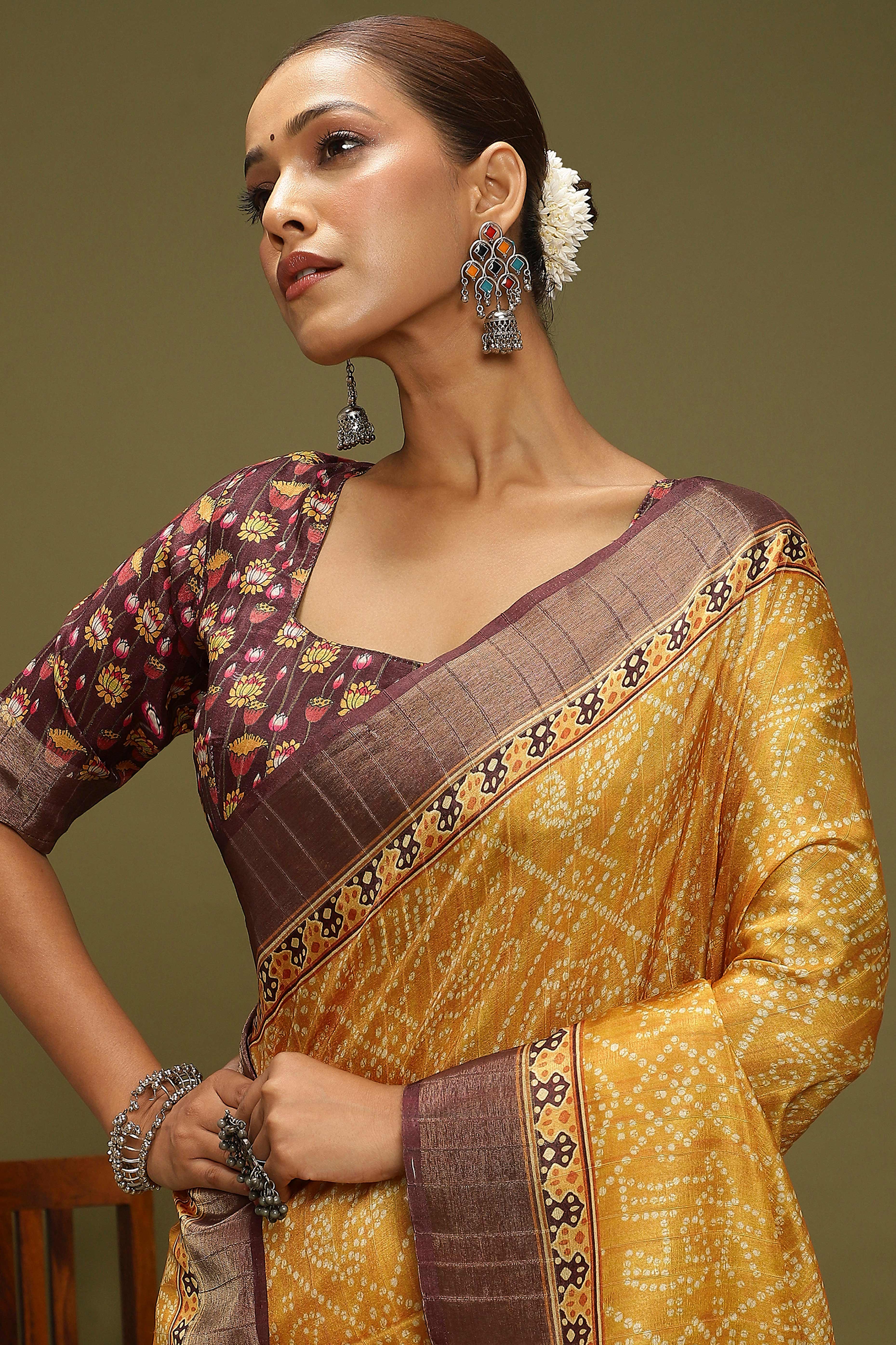 Yellow Silk Blend Saree Decorated with Vibrant Bandhani Prints and Festive Detailing
