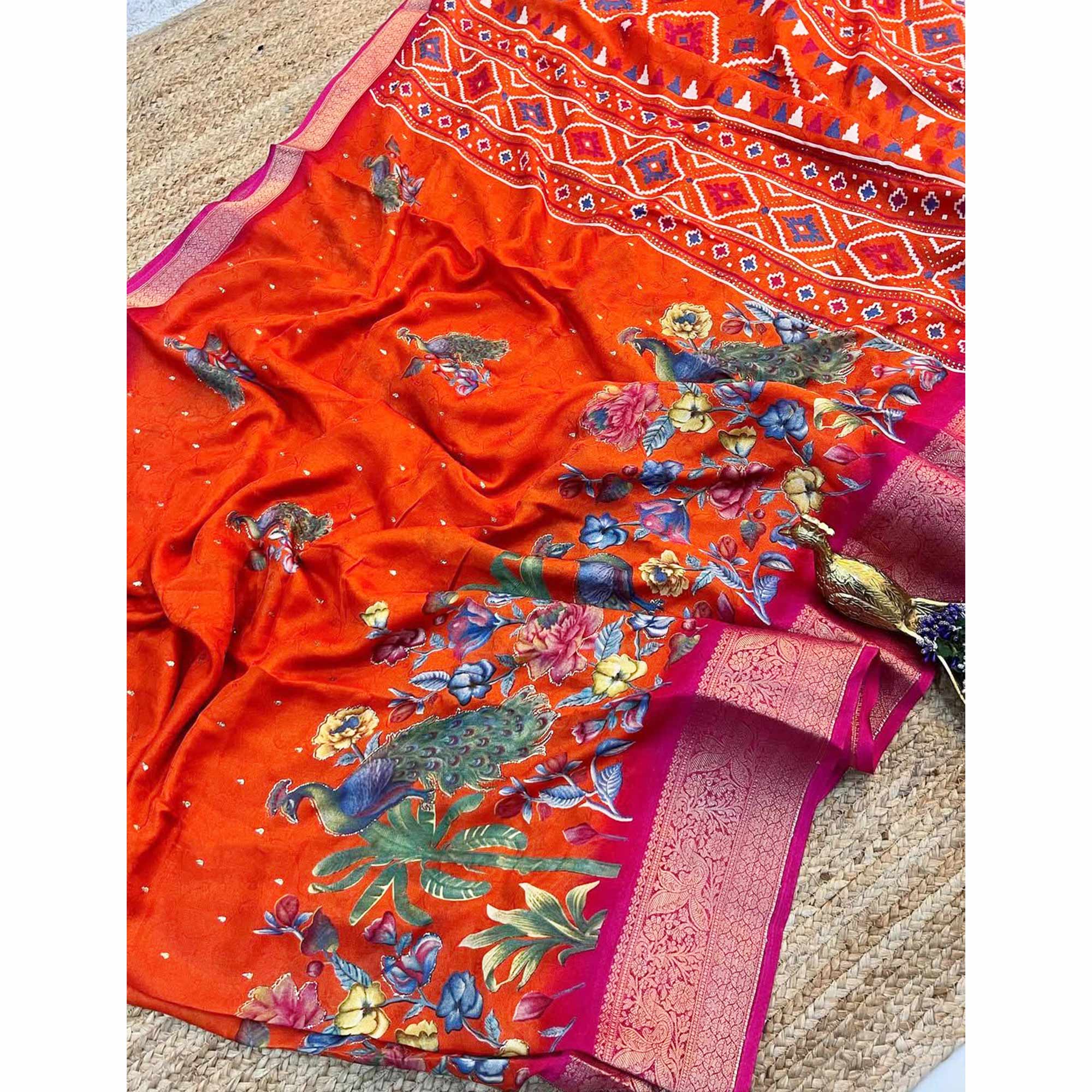 Elegant Orange Peacock & Floral Printed Georgette Saree Accented With Gleaming Weaving Zari Border