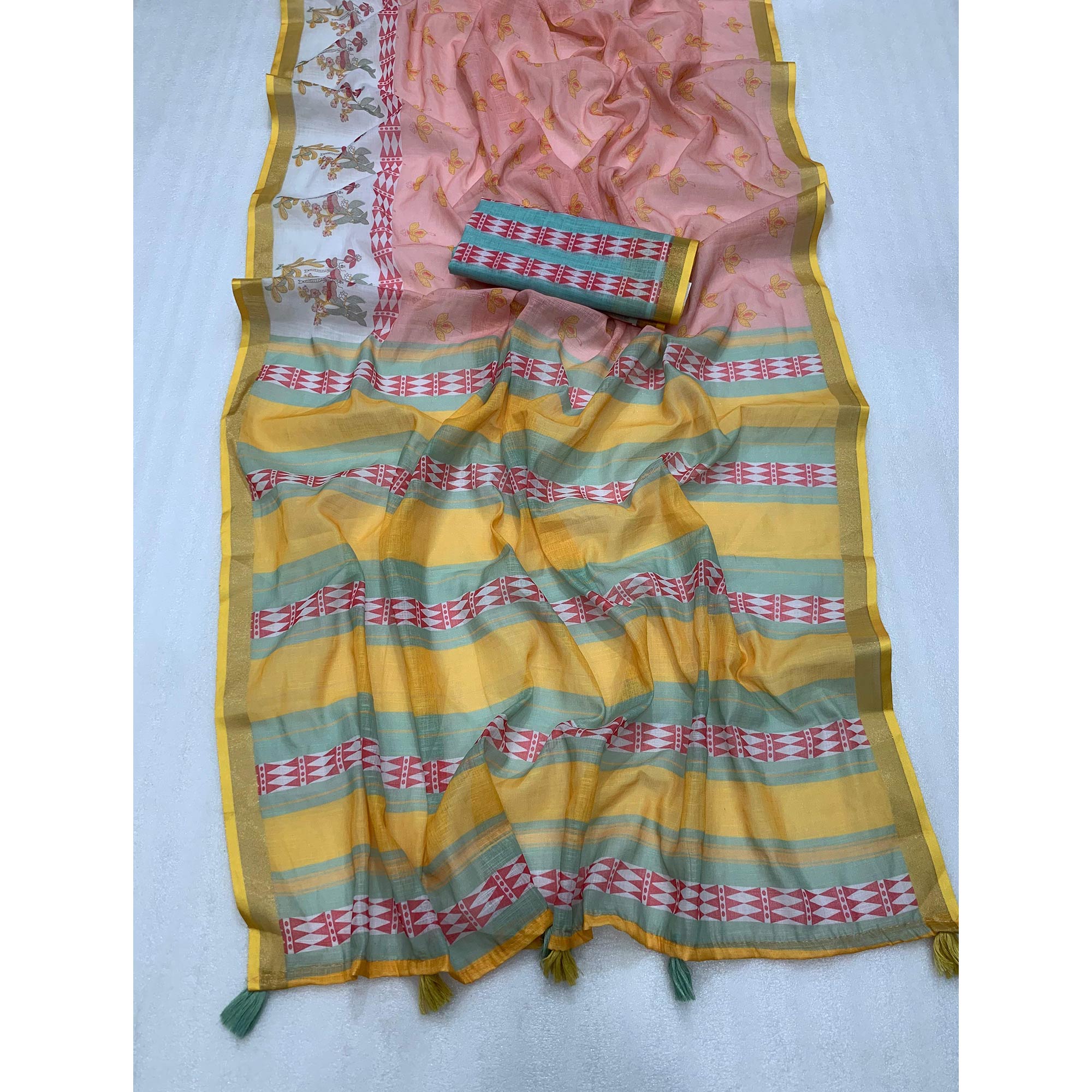 Peach Batik Printed Pure Linen Saree With Tassels