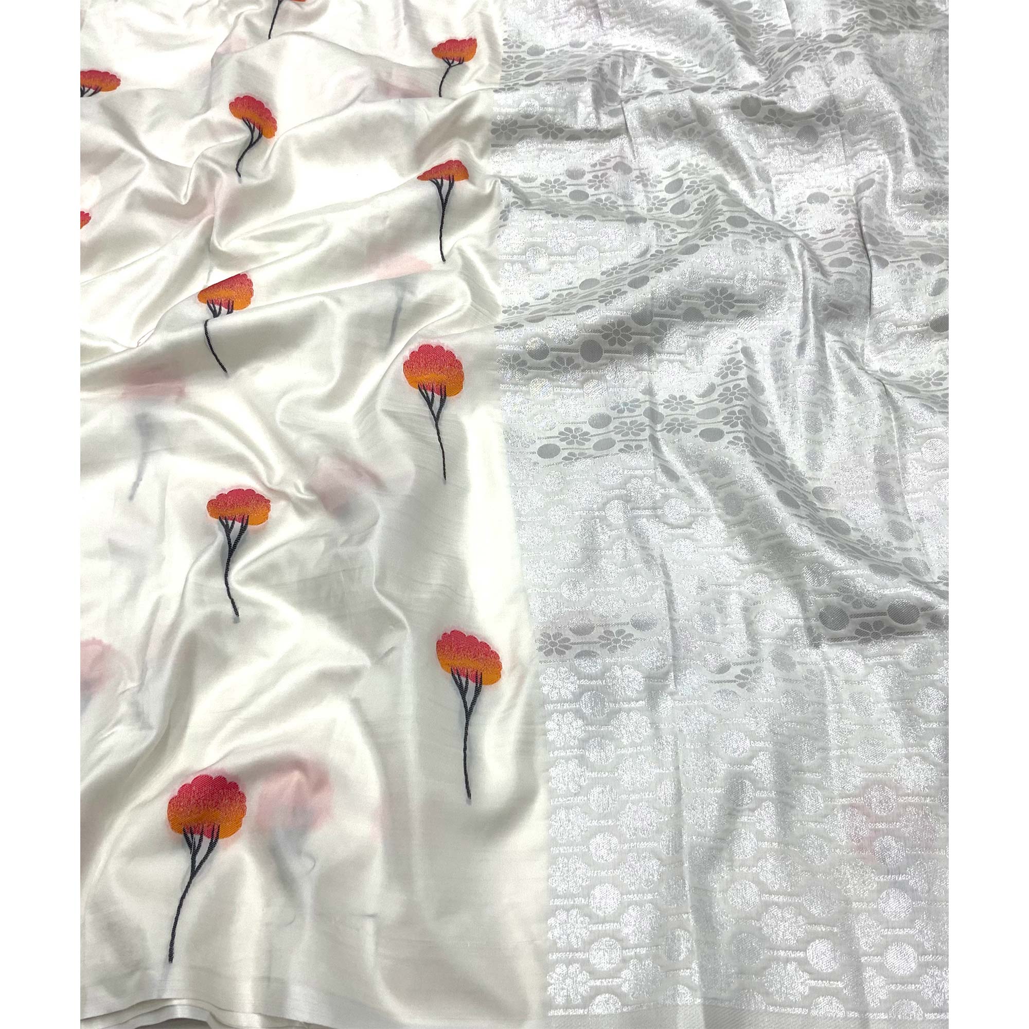 Elegant White Banarasi Silk Saree With Floral Zari Weaving & Tassel Border