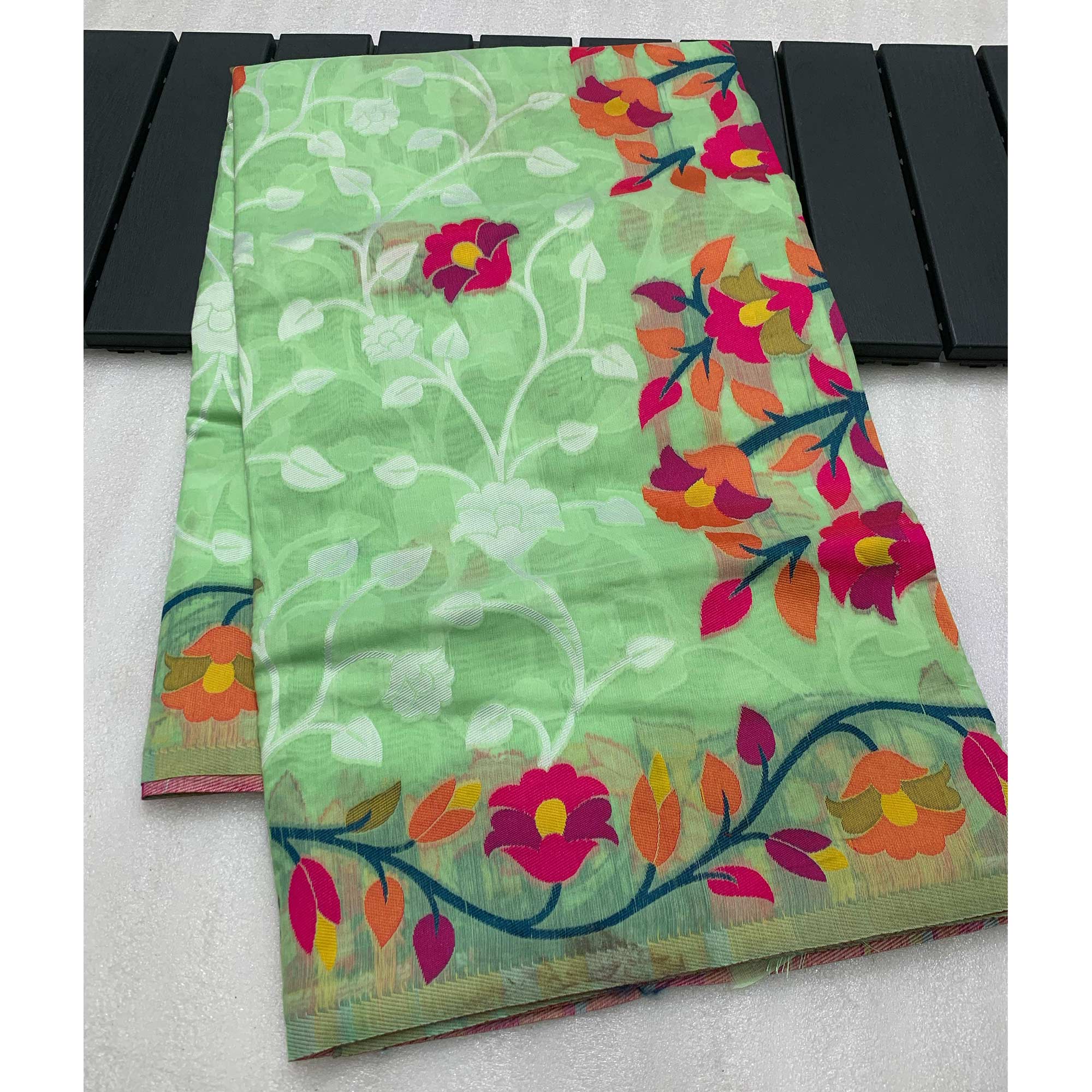 Green Floral Woven Cotton Jacquard Jamdani Saree With A Graceful Tassel Border