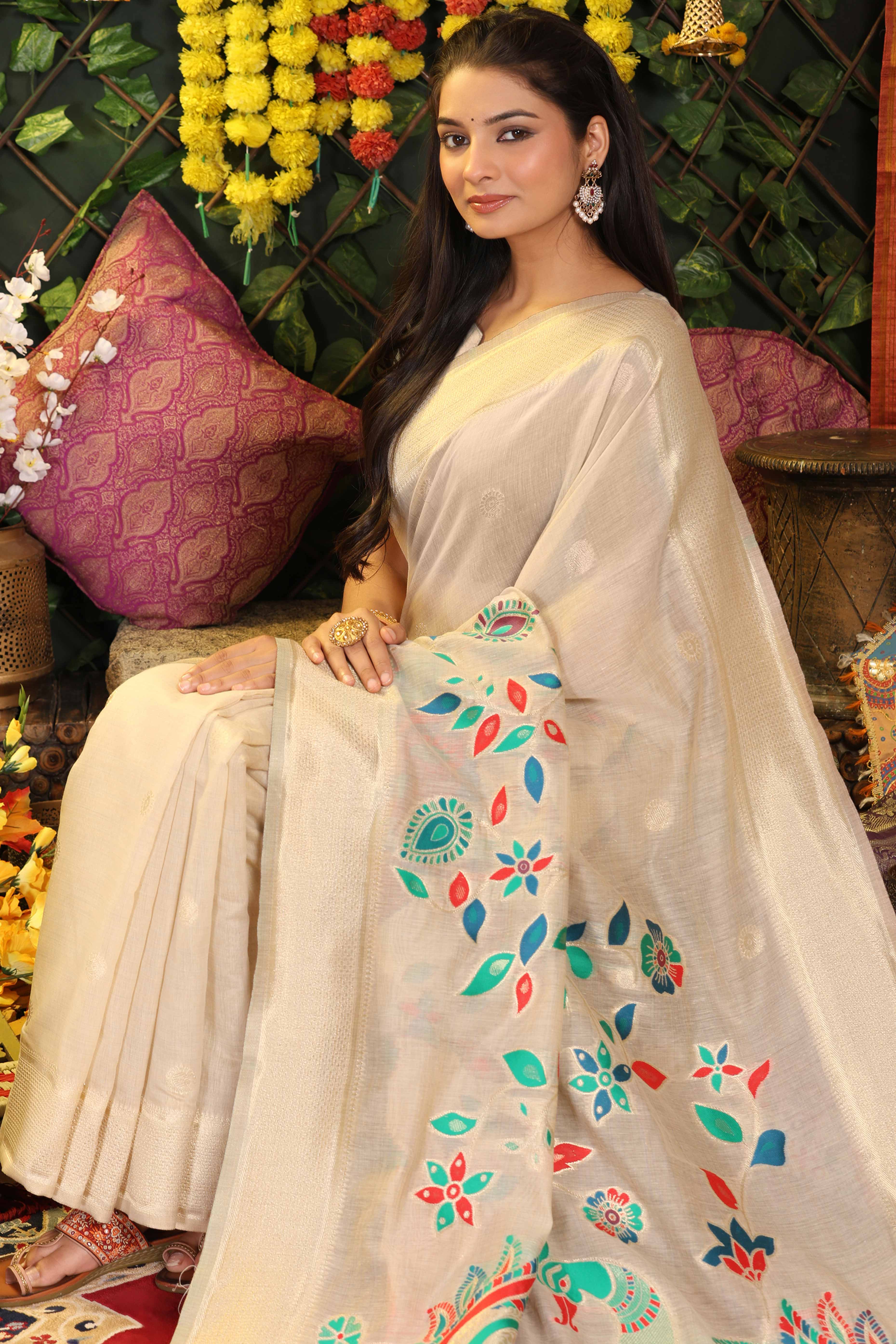 Cream Linen Cotton Saree Showcasing Floral & Peacock Zari Woven Design