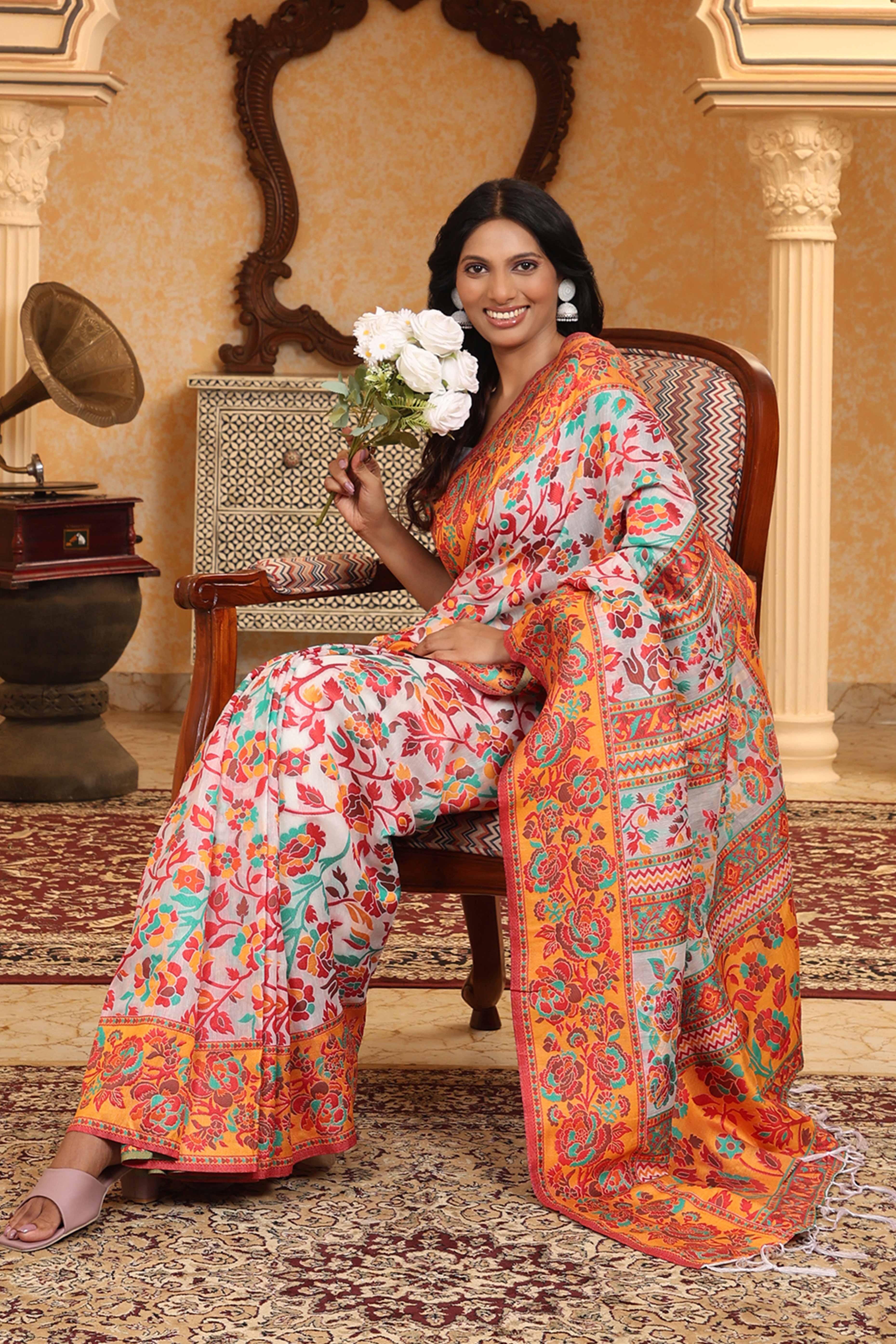 White With Multicolor Linen Cotton Silk  Saree Enhanced Floral Zari Weaving & Tasselled Pallu