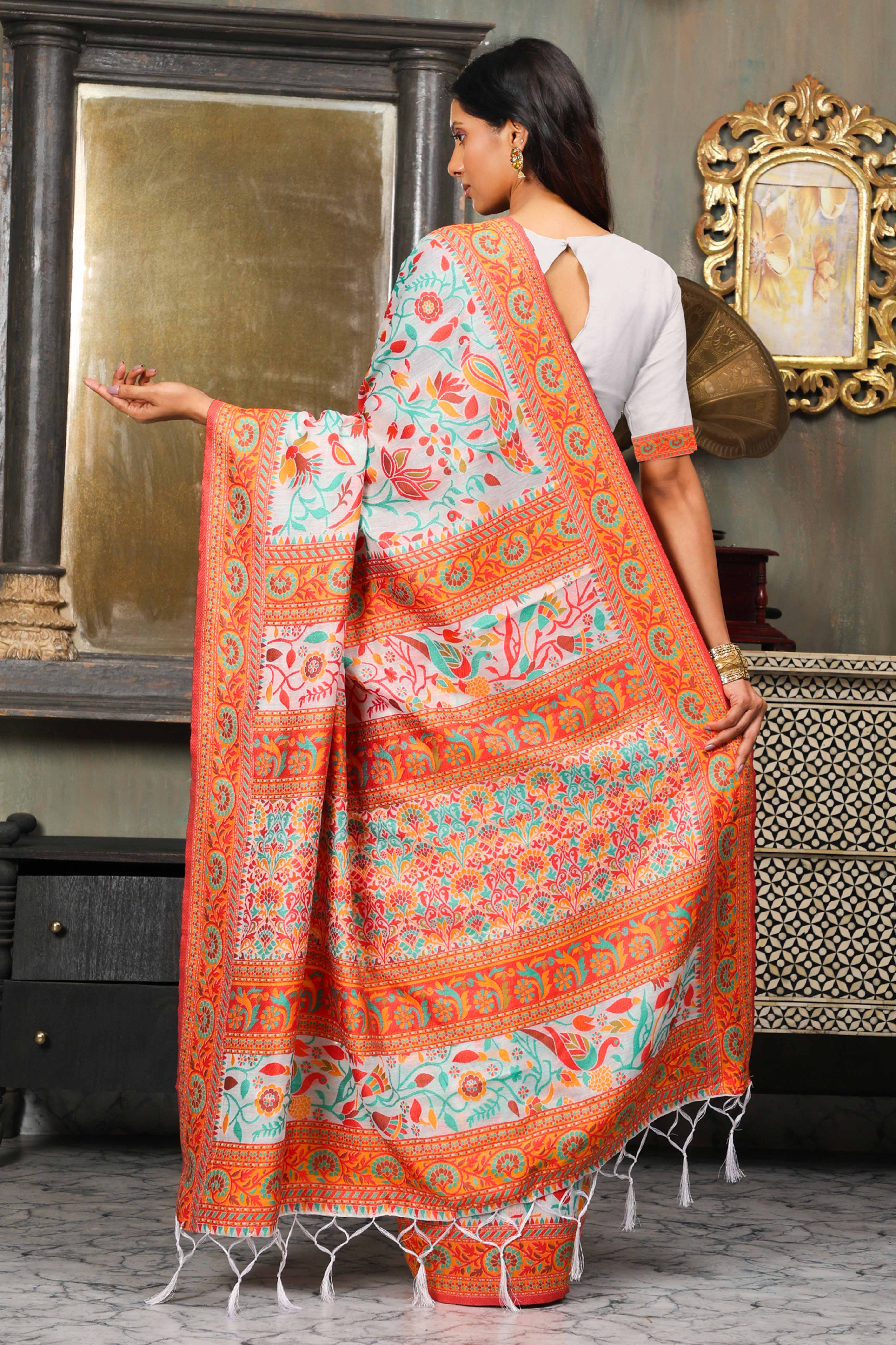 White With Multicolor Linen Cotton Silk  Saree Enhanced Floral Zari Weaving & Tasselled Pallu