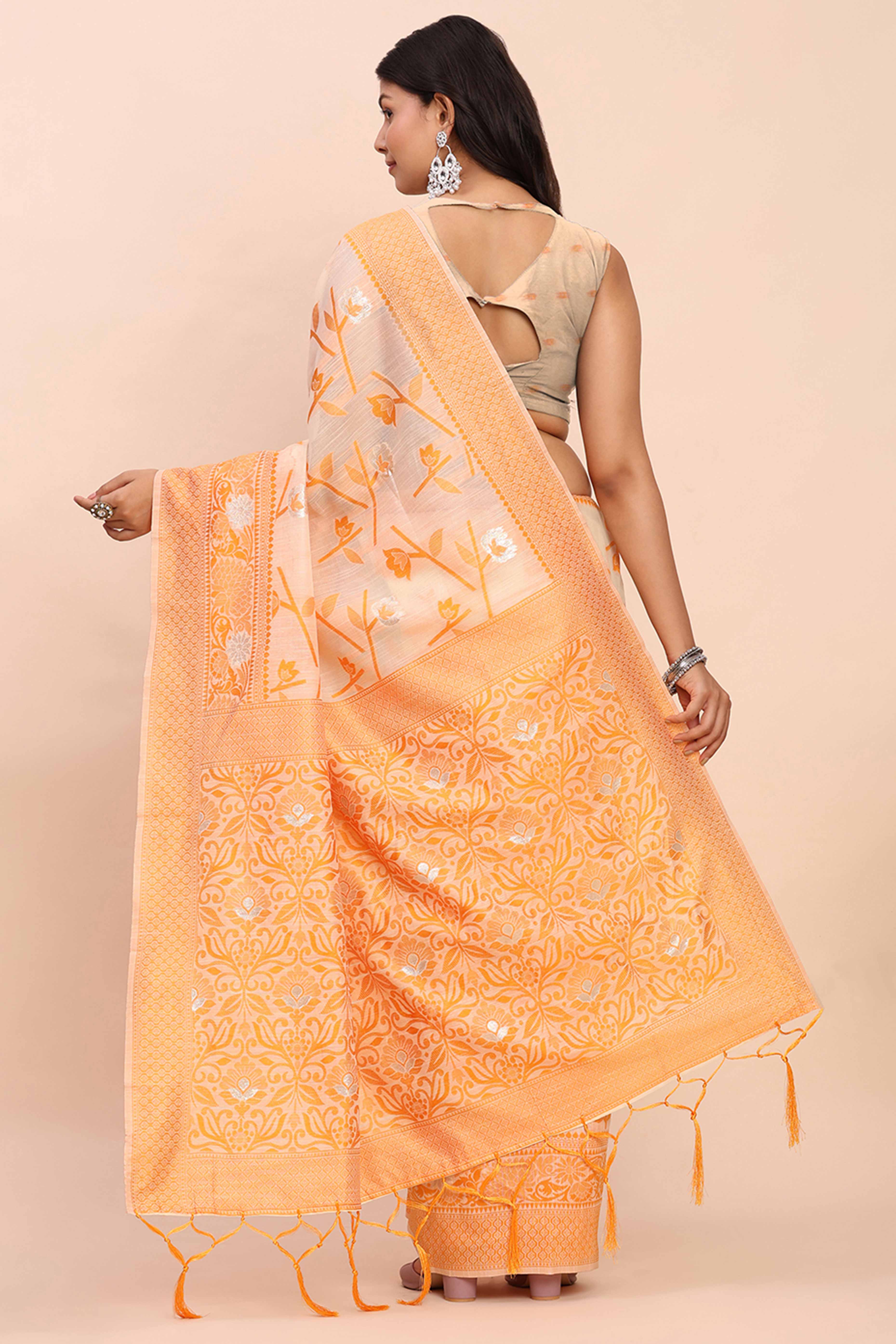 Orange Floral Linen Cotton Saree Accented With Zari Weaving & Tassel Pallu Elegance