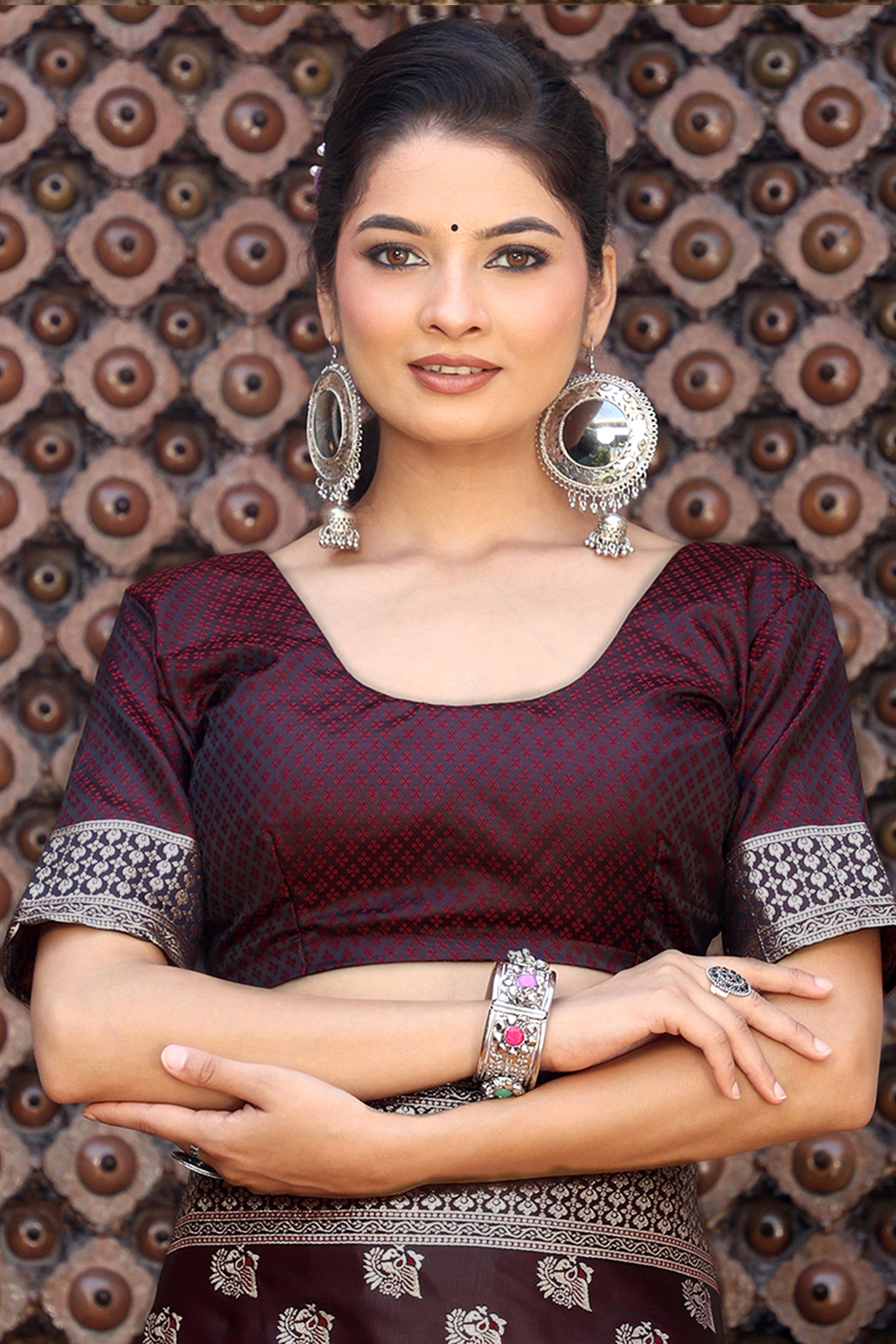 Designer Dark Maroon Saree Showcasing Peacock & Floral Zari Weaving With Handmade Tassel Pallu