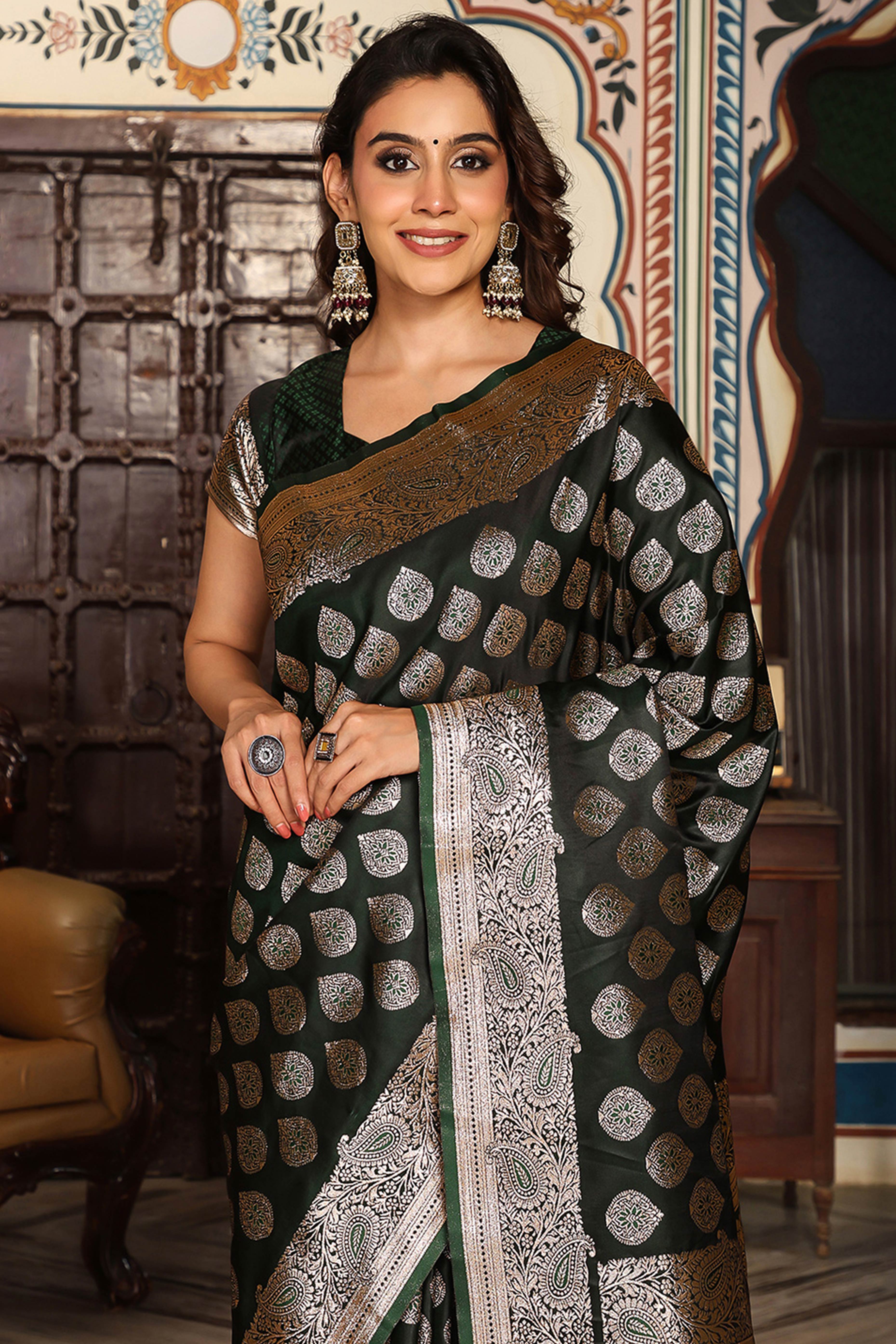 Festive Dark Green Saree in Silk Blend with Exquisite Zari Weaving Work