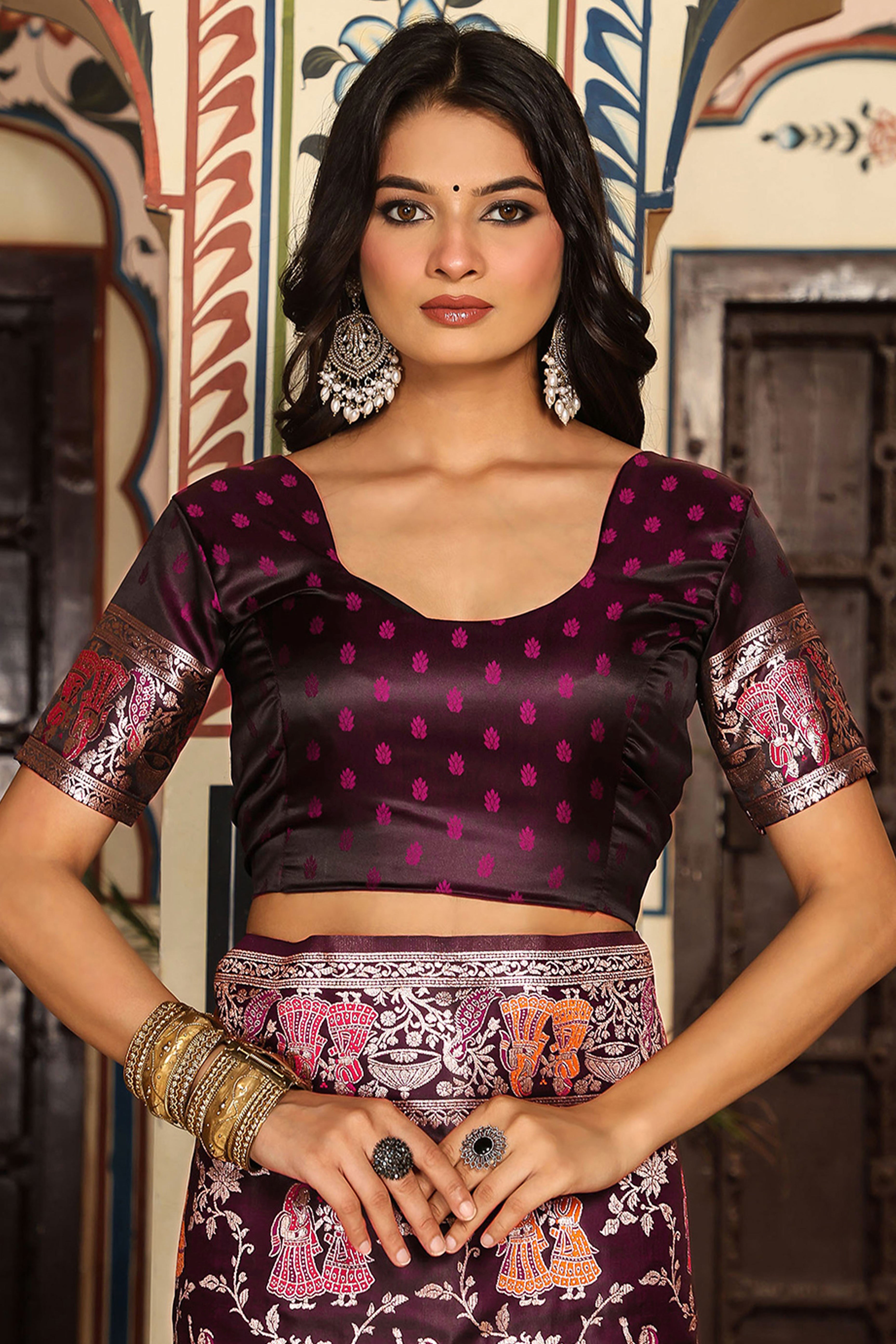 Luxurious Wine Silk Blend Saree With Intricate Floral Zari Weaving & Tassel Pallu