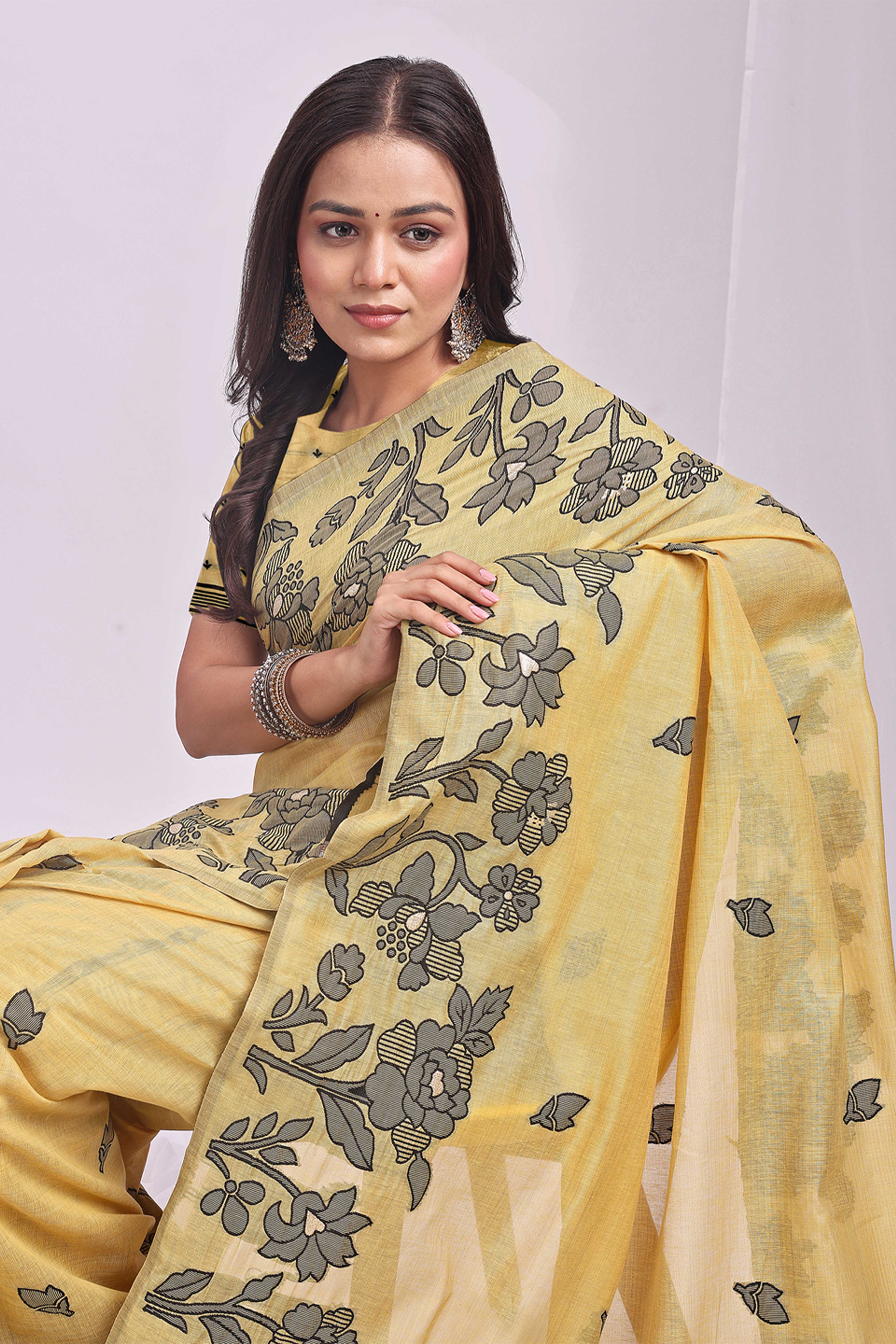 Yellow Ethnic Saree in a Linen Cotton Blend Adorned with Floral Weave Designs