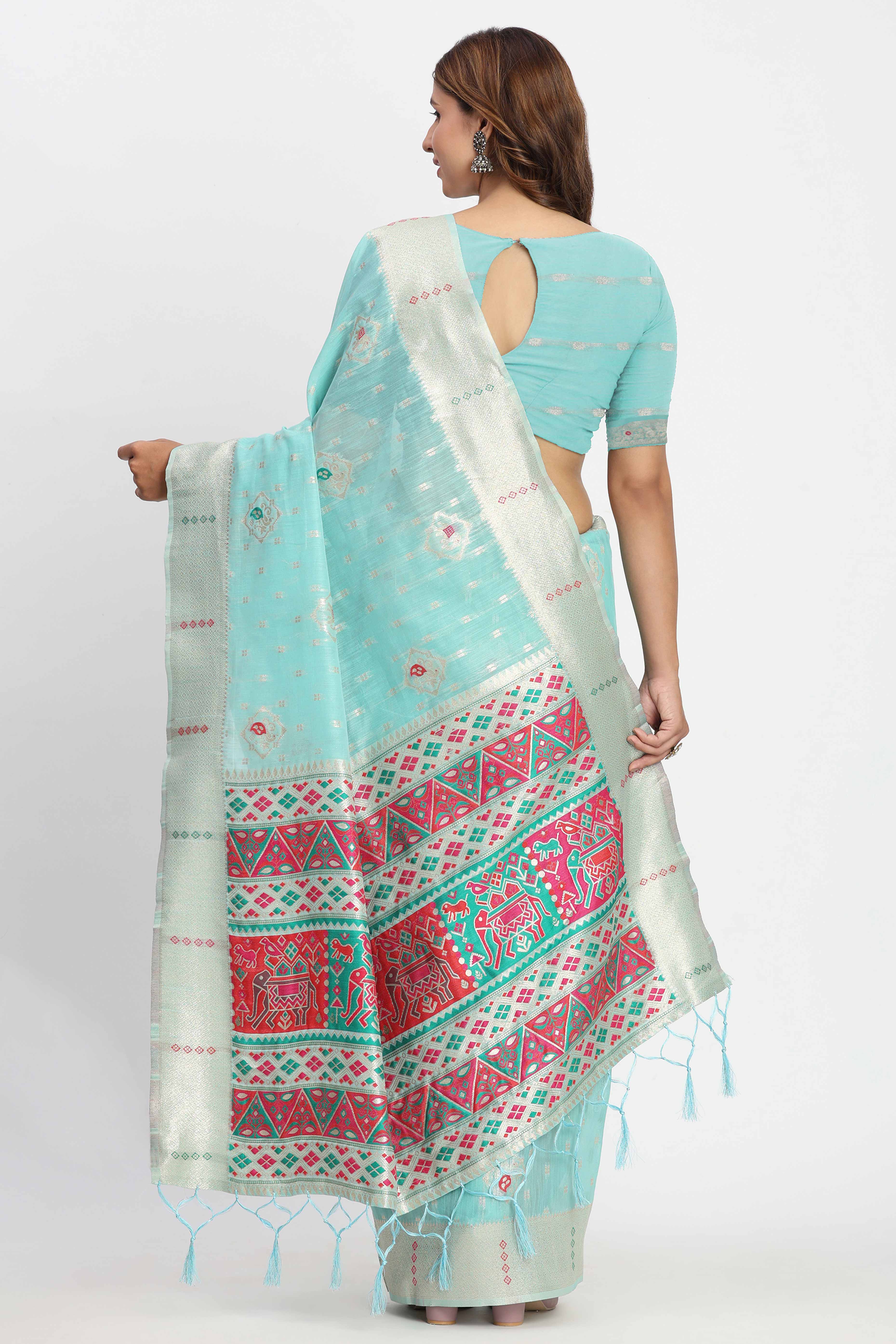 Shimmering Turquoise linen Cotton Saree Embellished With Rich Zari Weaving And Tassels Pallu