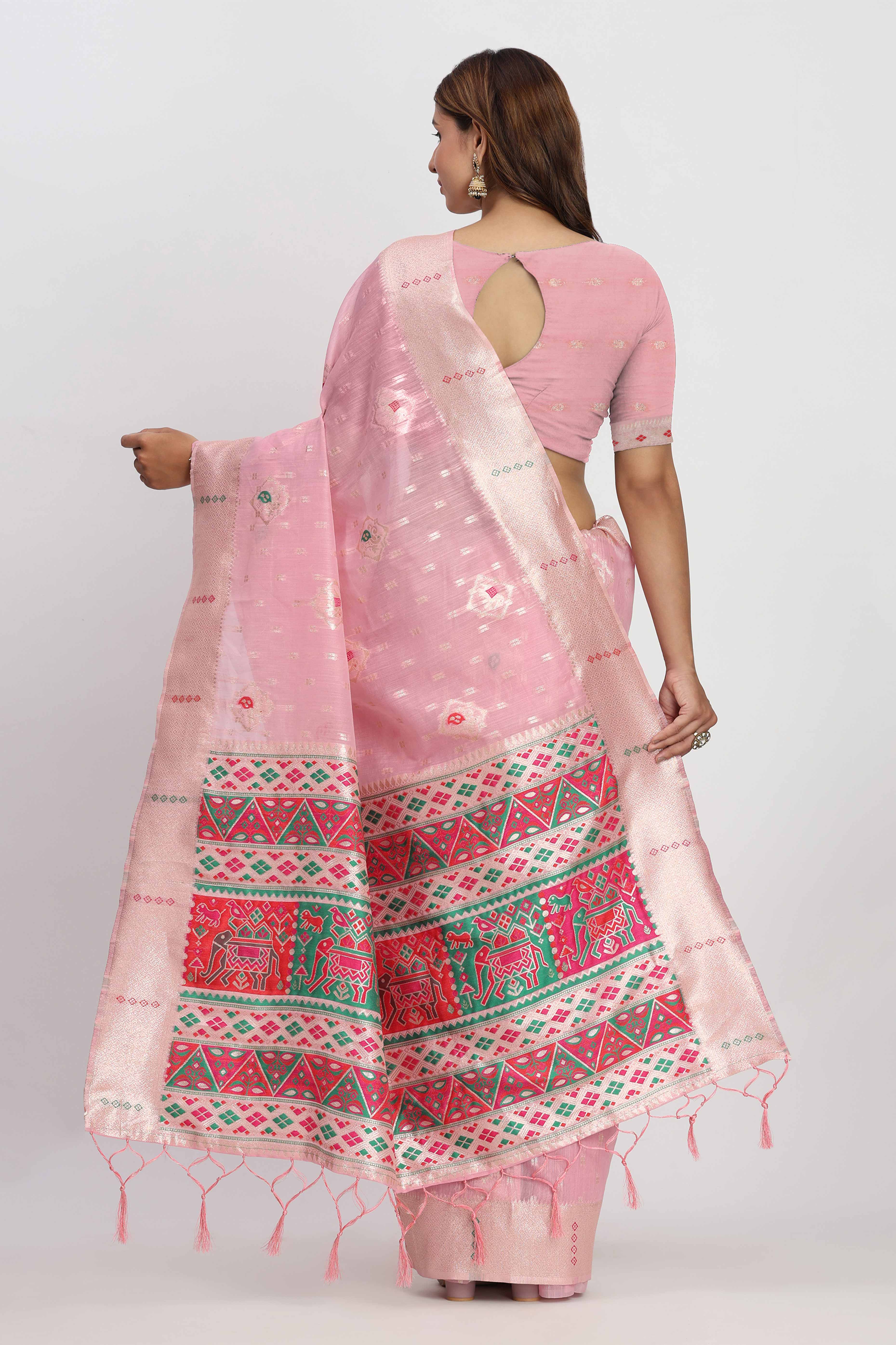 Shimmering Light Pink linen Cotton Saree Embellished With Rich Zari Weaving And Tassels Pallu