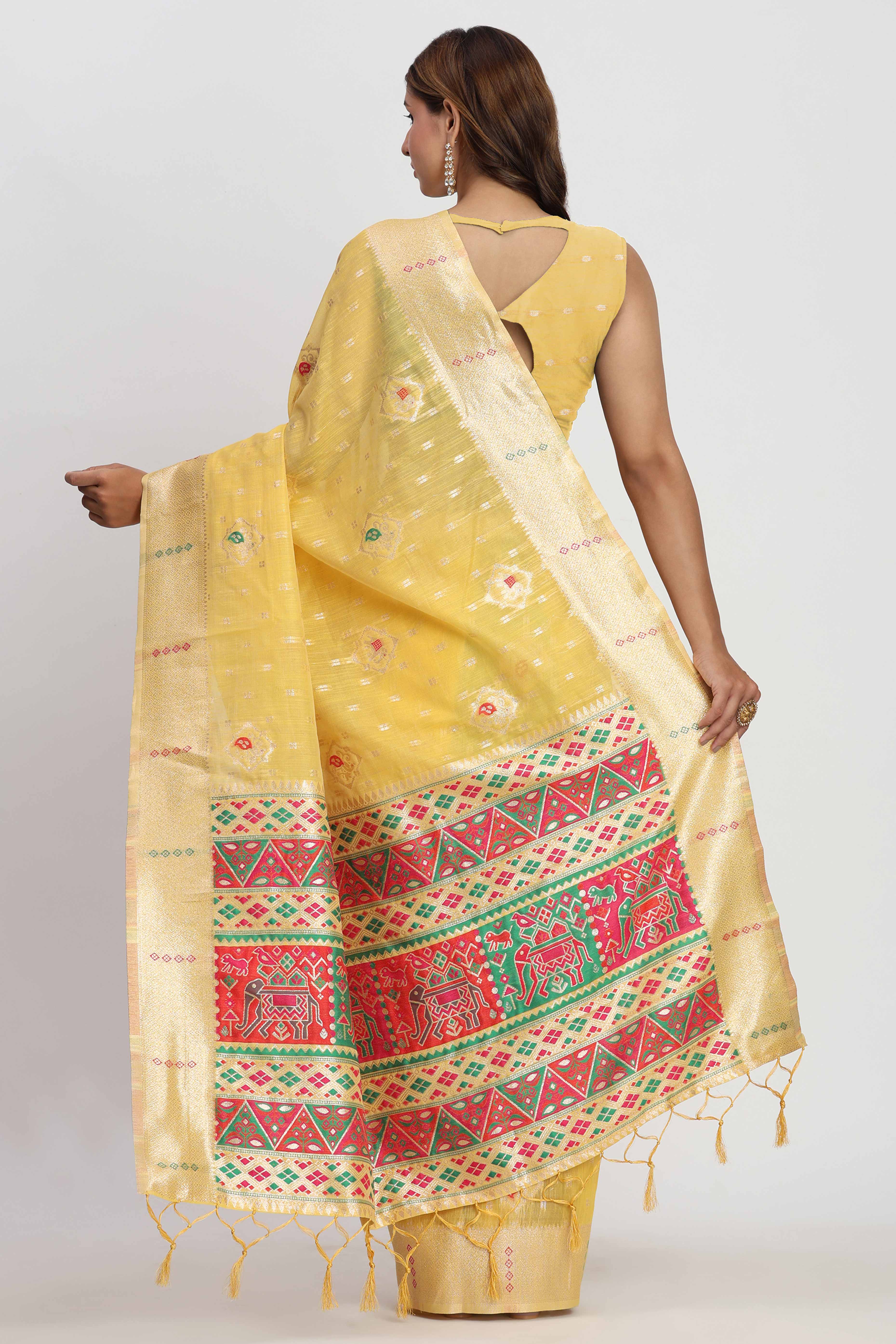 Shimmering Yellow linen Cotton Saree Embellished With Rich Zari Weaving And Tassels Pallu