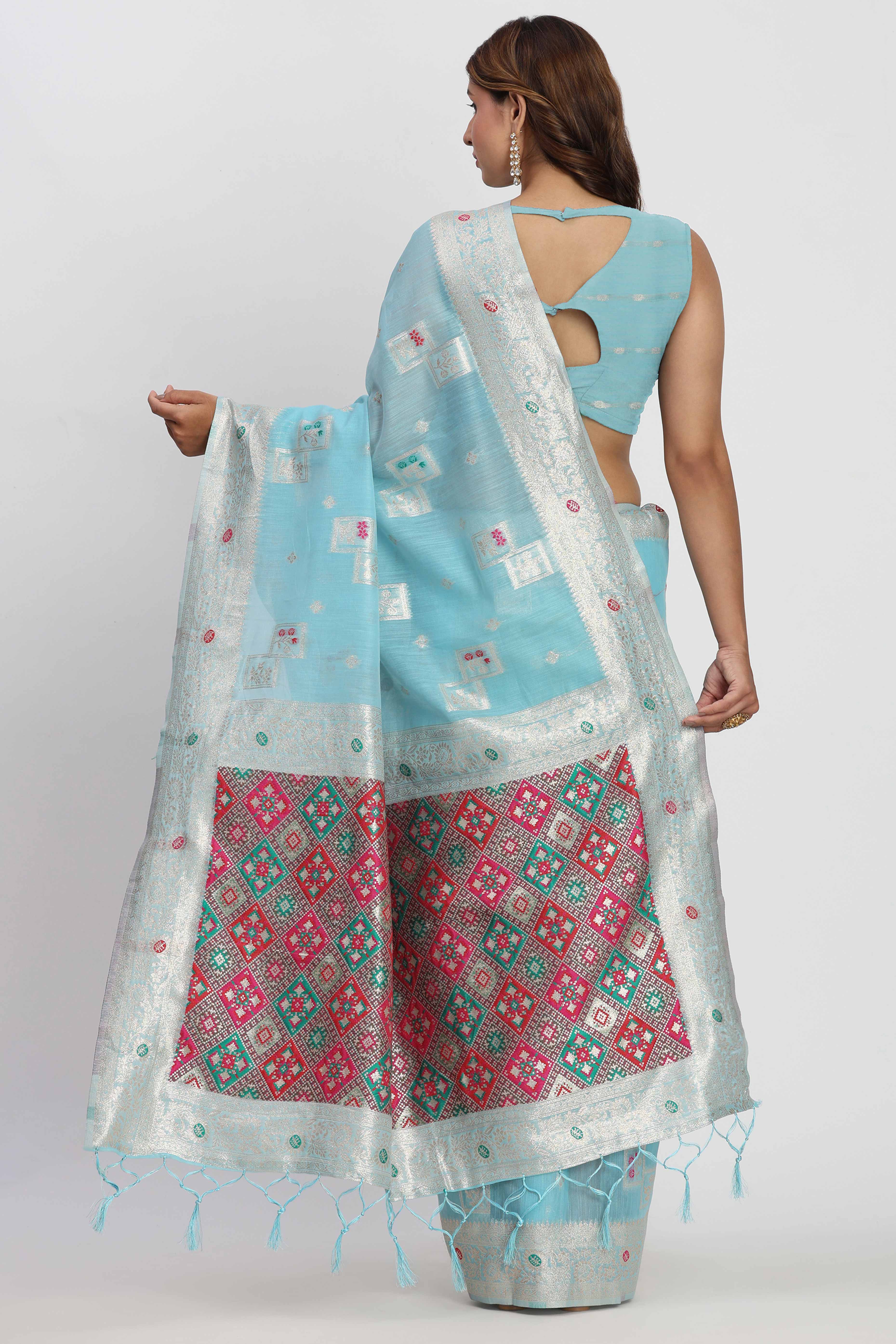 Floral Zari Weaving Brings Regal Beauty To This Sky Blue Linen Cotton Saree With Tassel Accents
