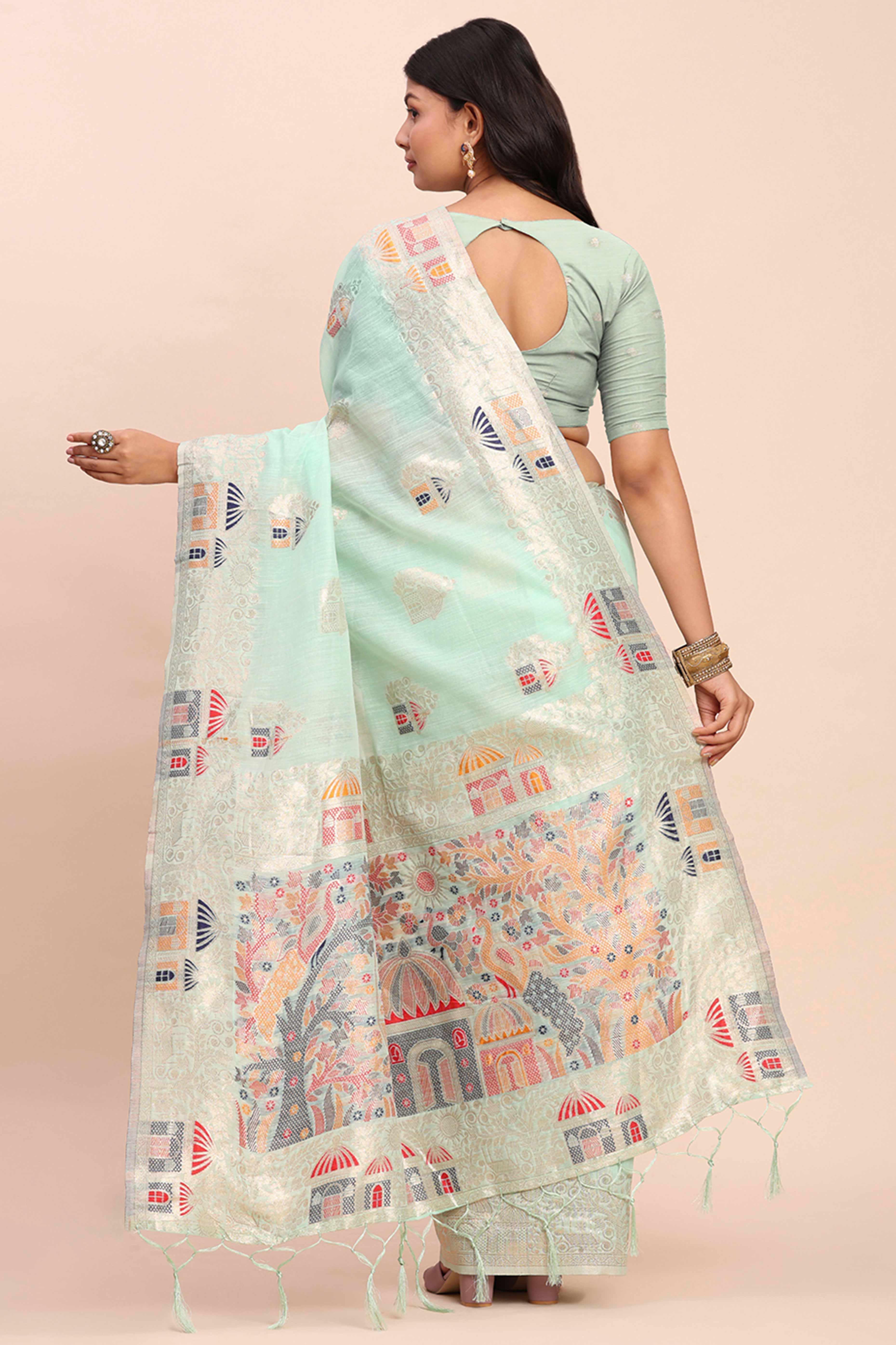 Sea Green Bloom Zari Woven Linen Cotton Saree Adorned With Floral Motifs & A Tassel Finish