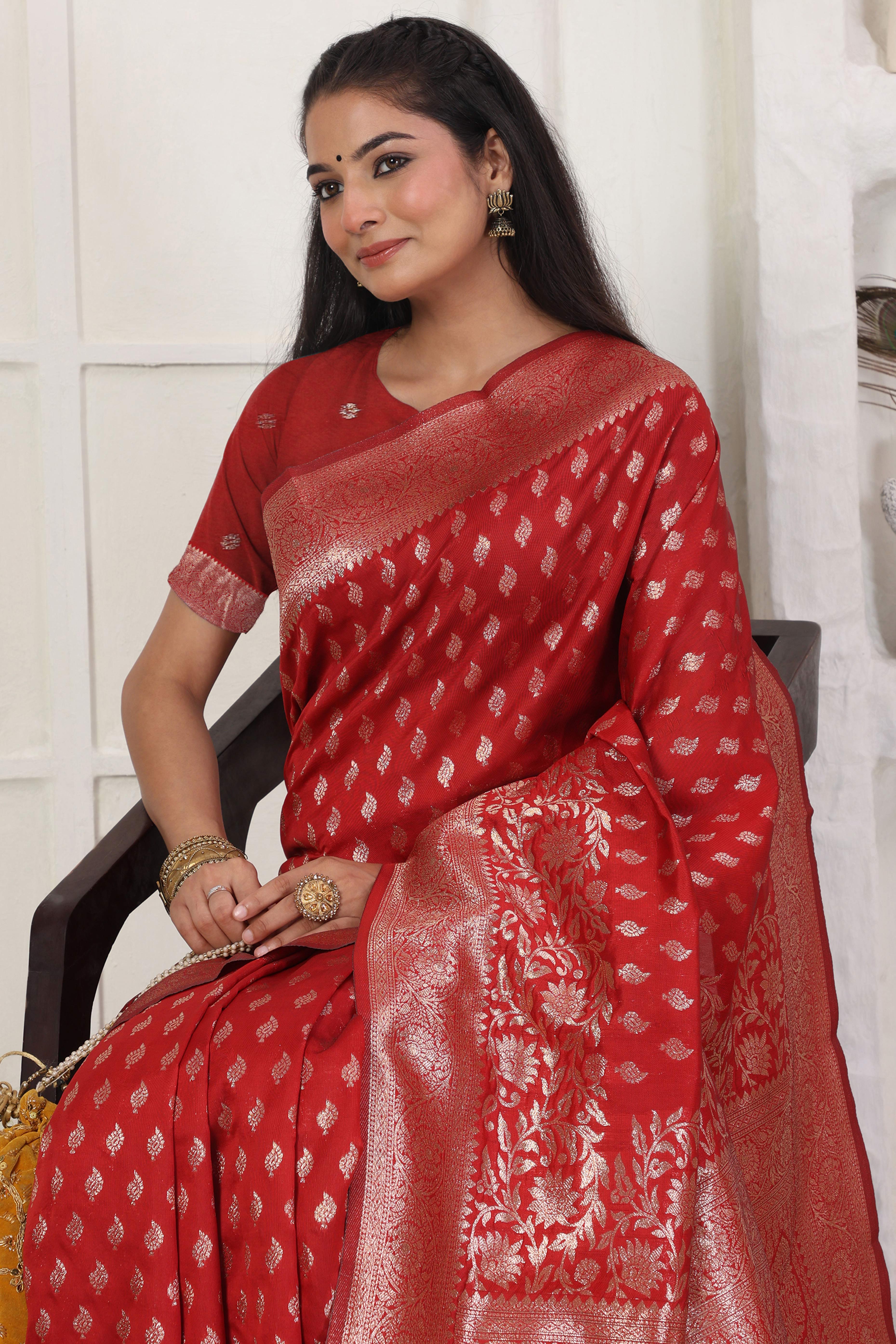 Red Traditional Lichi Silk Blend Saree Enhanced With Floral Zari Weaving & Tassel Pallu