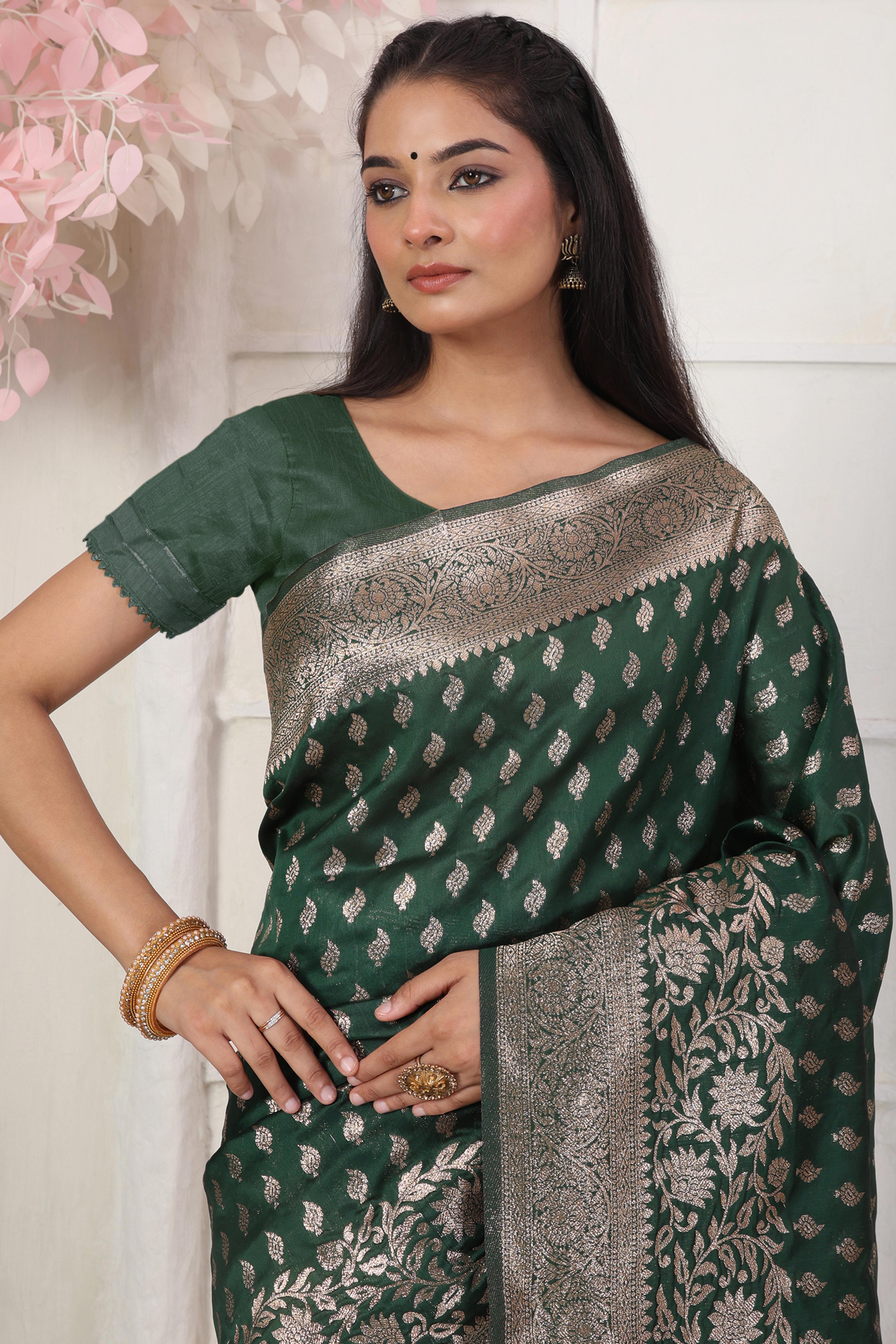 Green Traditional Lichi Silk Blend Saree Enhanced With Floral Zari Weaving & Tassel Pallu