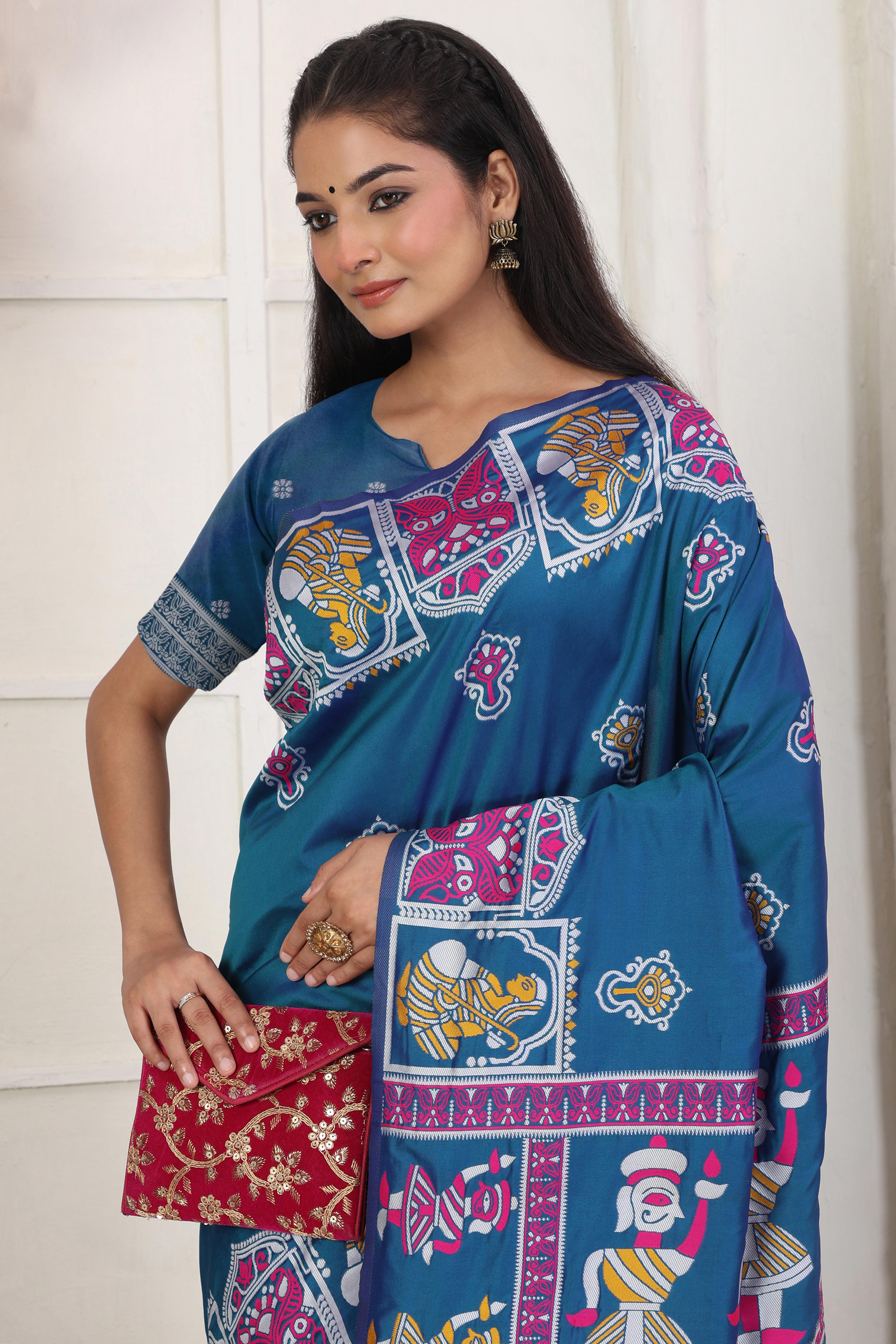 Teal Blue Ethnic Madhubani Print Silk Blend Saree Enhanced With Tassel Pallu Accents