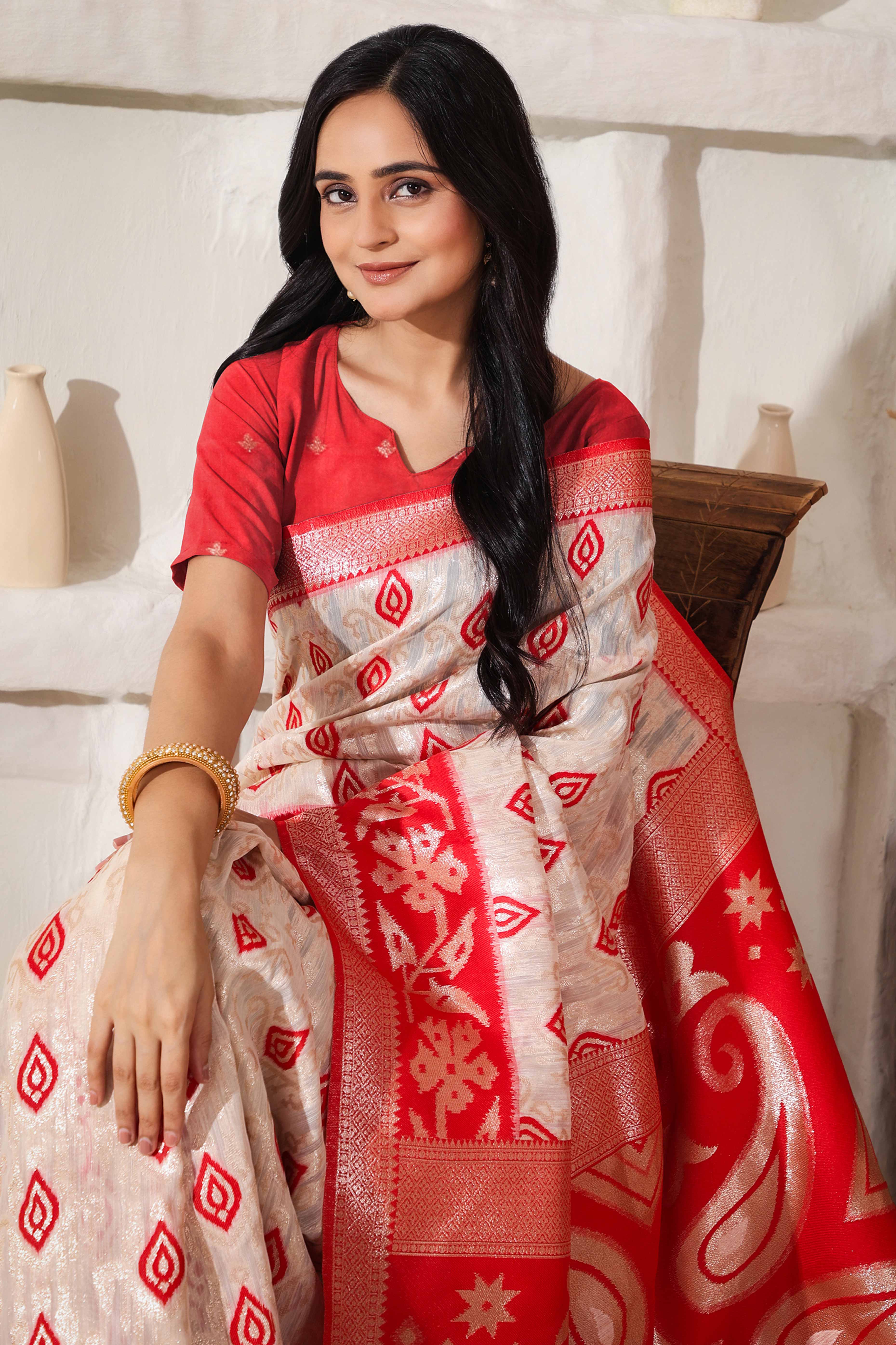 Classic White & Red Saree In Linen Cotton With Rich Zari Weaving And Tassel Accents