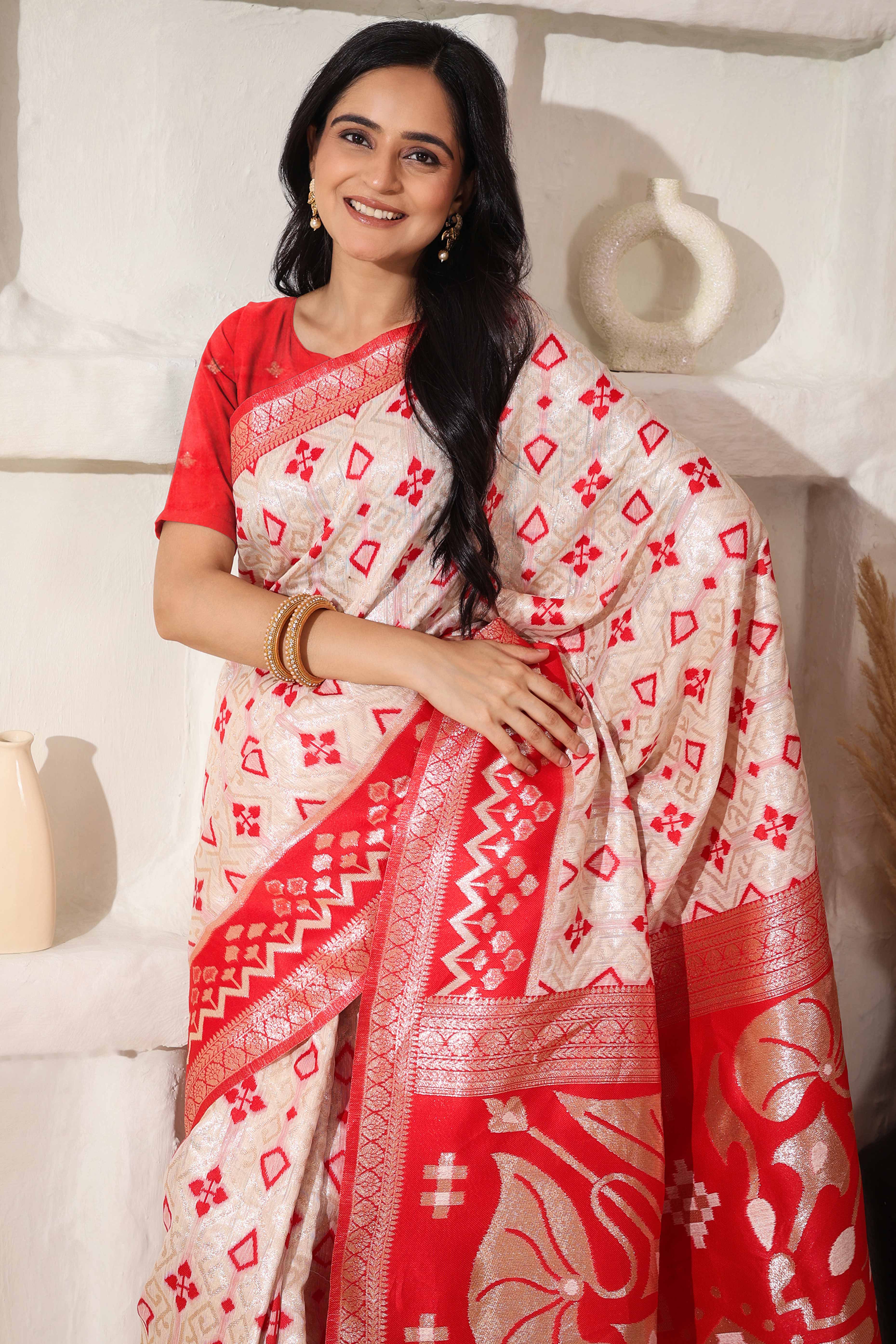Graceful White & Red Saree In Linen Cotton With Fine Zari Weaving And Flowing Tassel Details