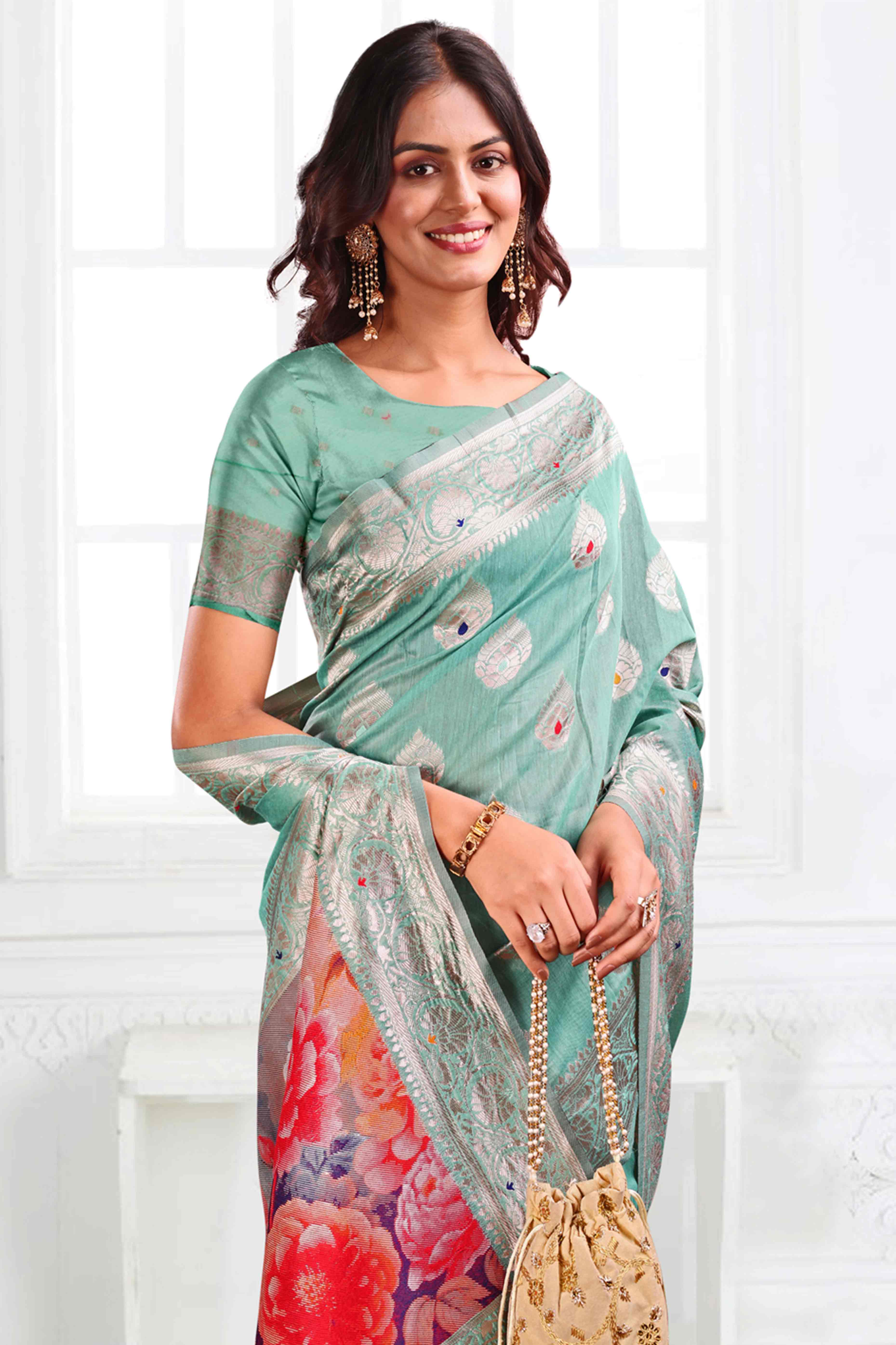 Turquoise Linen Cotton Silk Saree Adorned With Intricate Floral Zari Weaving & Tassel Pallu