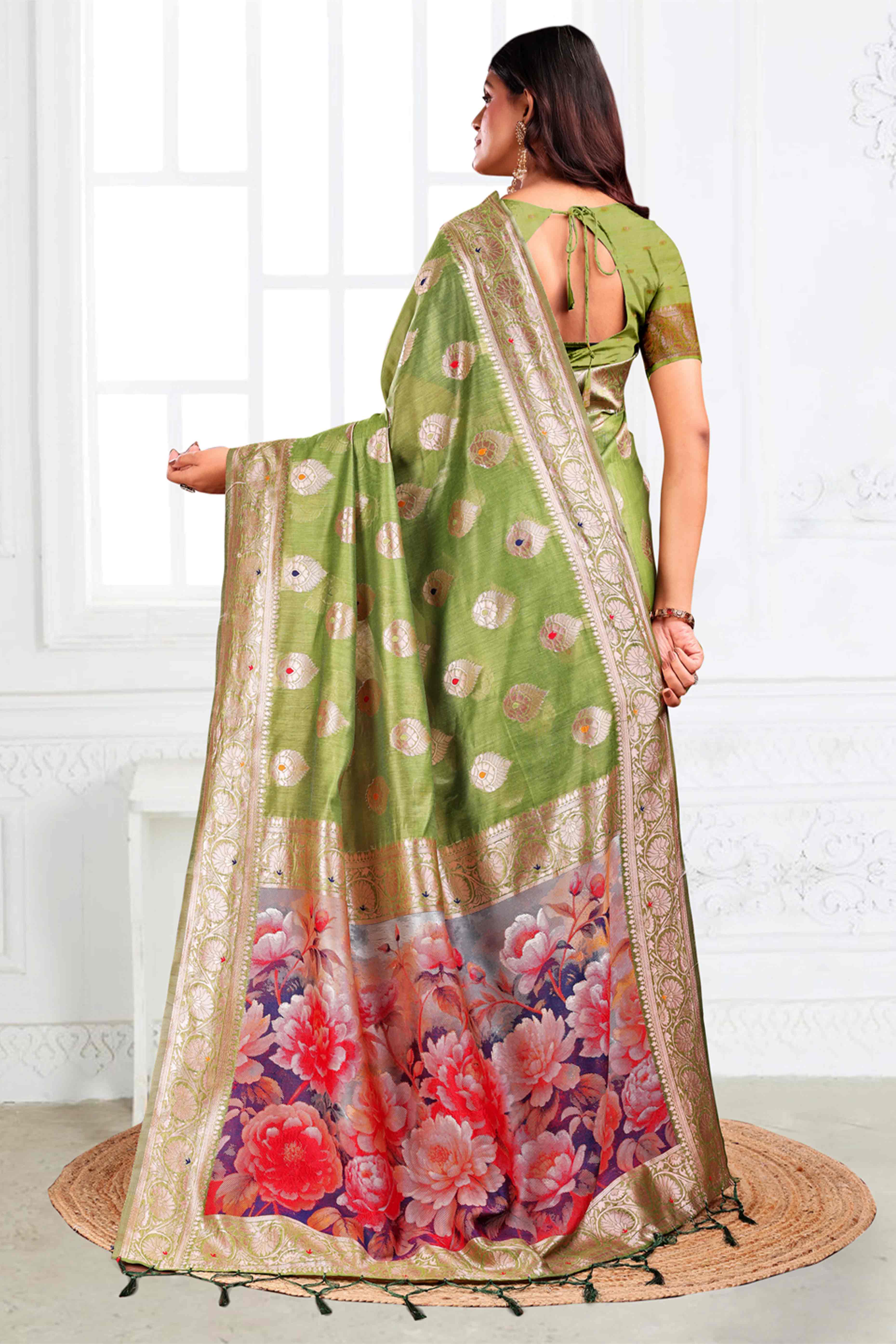 Green Linen Cotton Silk Saree Adorned With Intricate Floral Zari Weaving & Tassel Pallu
