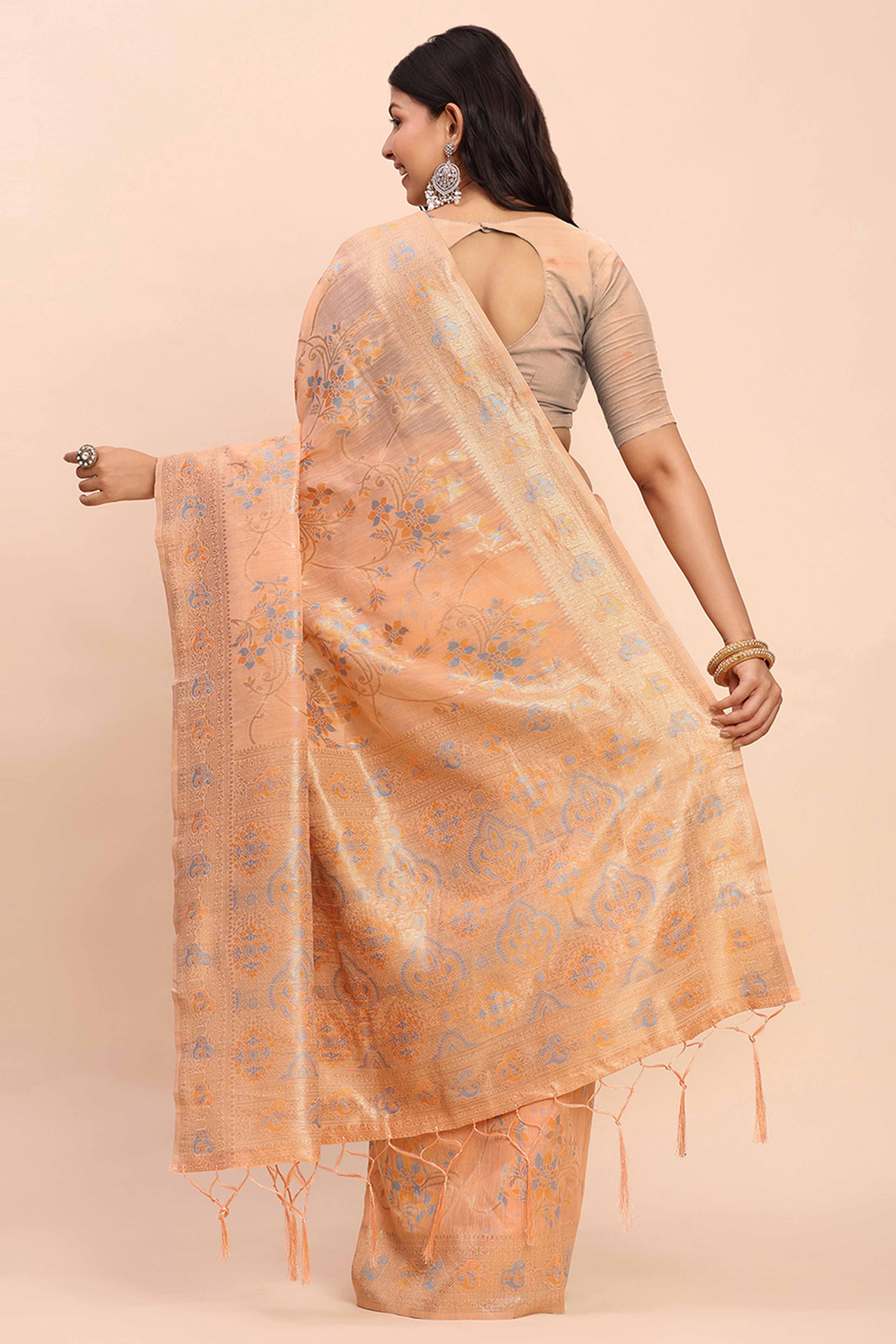 Light Orange Linen Cotton Saree Showcasing Floral Zari Weaves & A Tasselled Finish Pallu