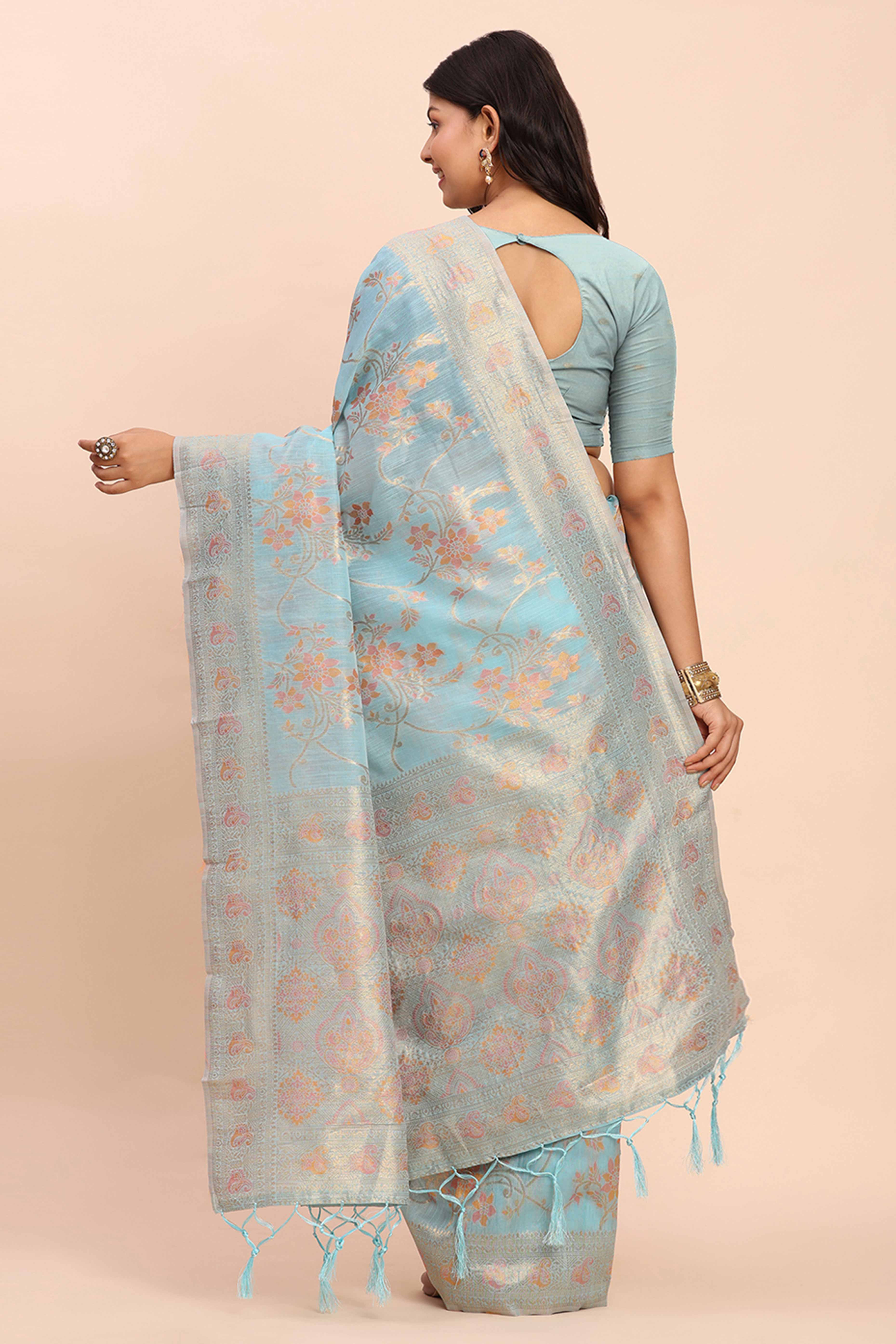 Sky Blue Linen Cotton Saree Showcasing Floral Zari Weaves & A Tasselled Finish Pallu
