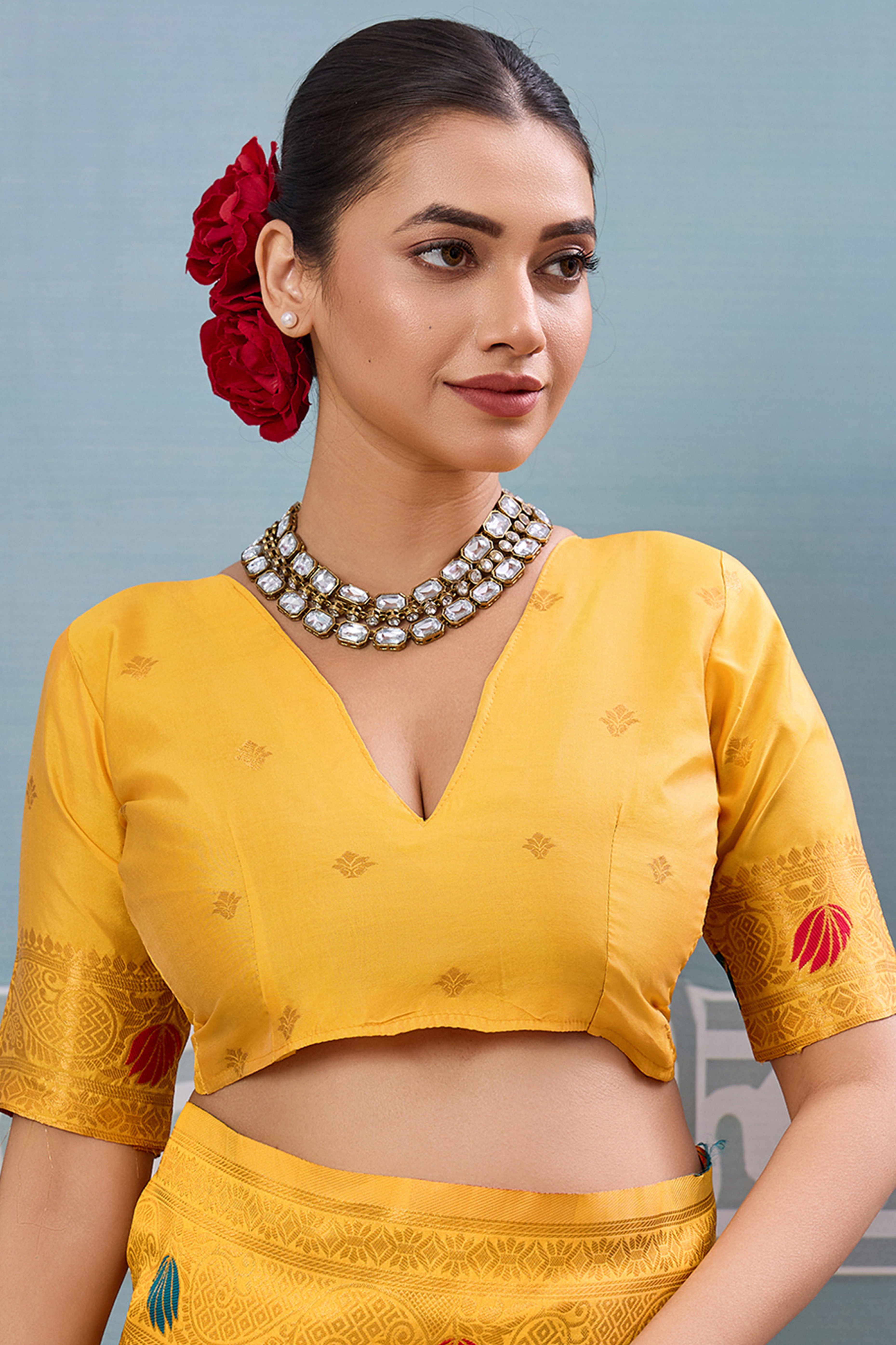 Radiant Yellow Silk Blend Saree Adorned With Intricate Floral Zari Weaving & Tassel Pallu