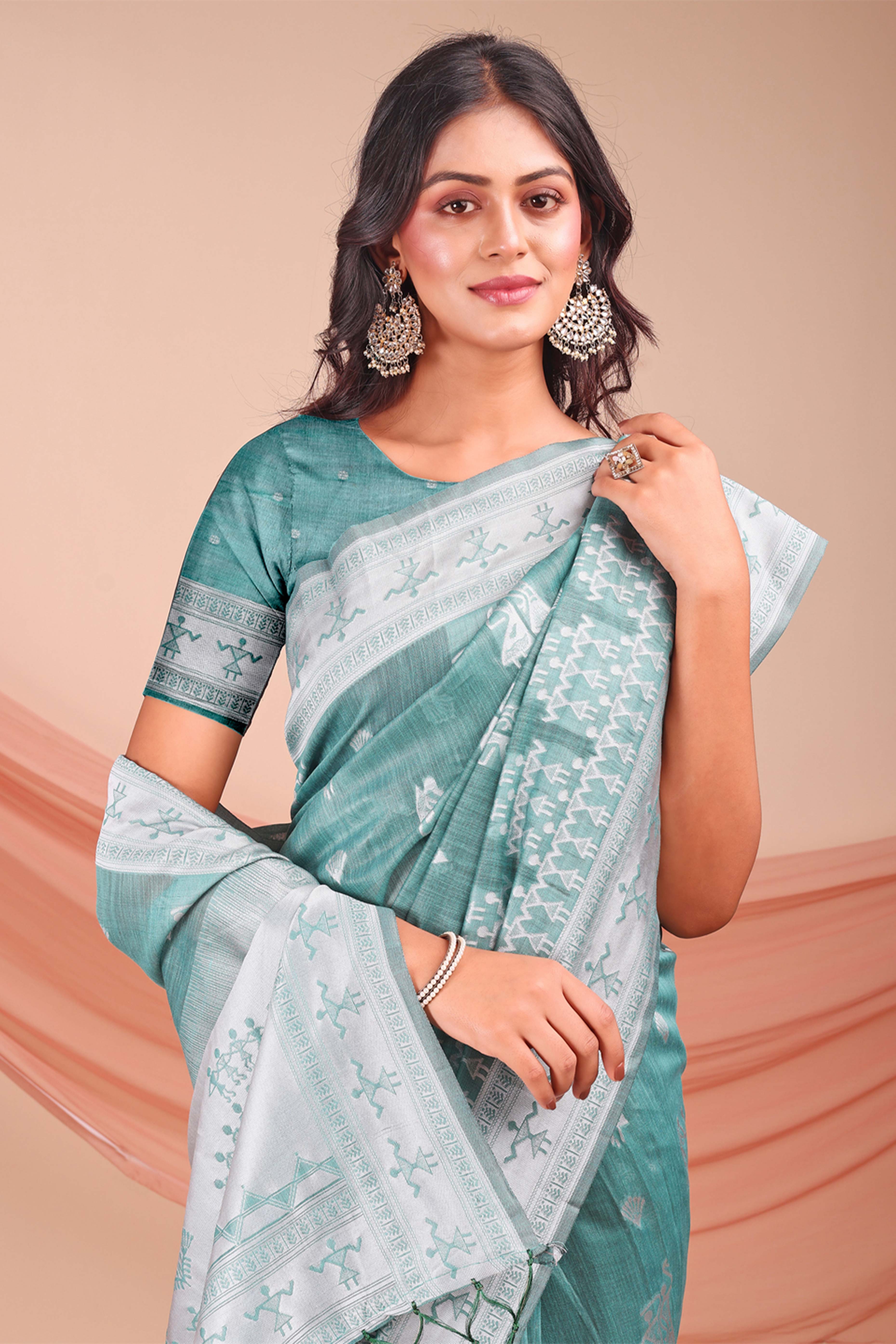 Sea Green Ethnic Saree in Soft Linen Cotton Fabric Featuring Warli Art Weaving