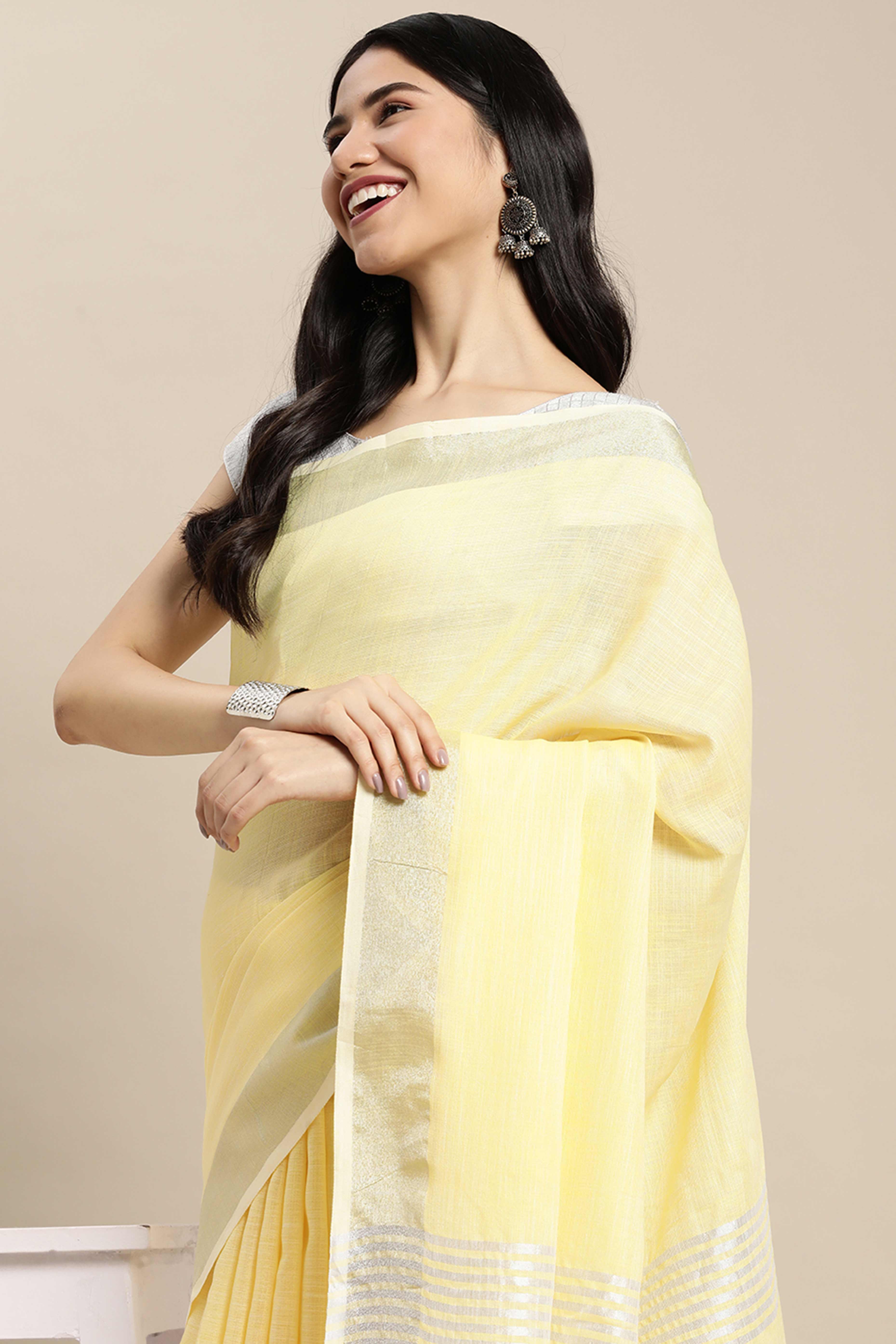 Yellow Linen Saree Adorned With Silver Zari Weaving Border & Pallu