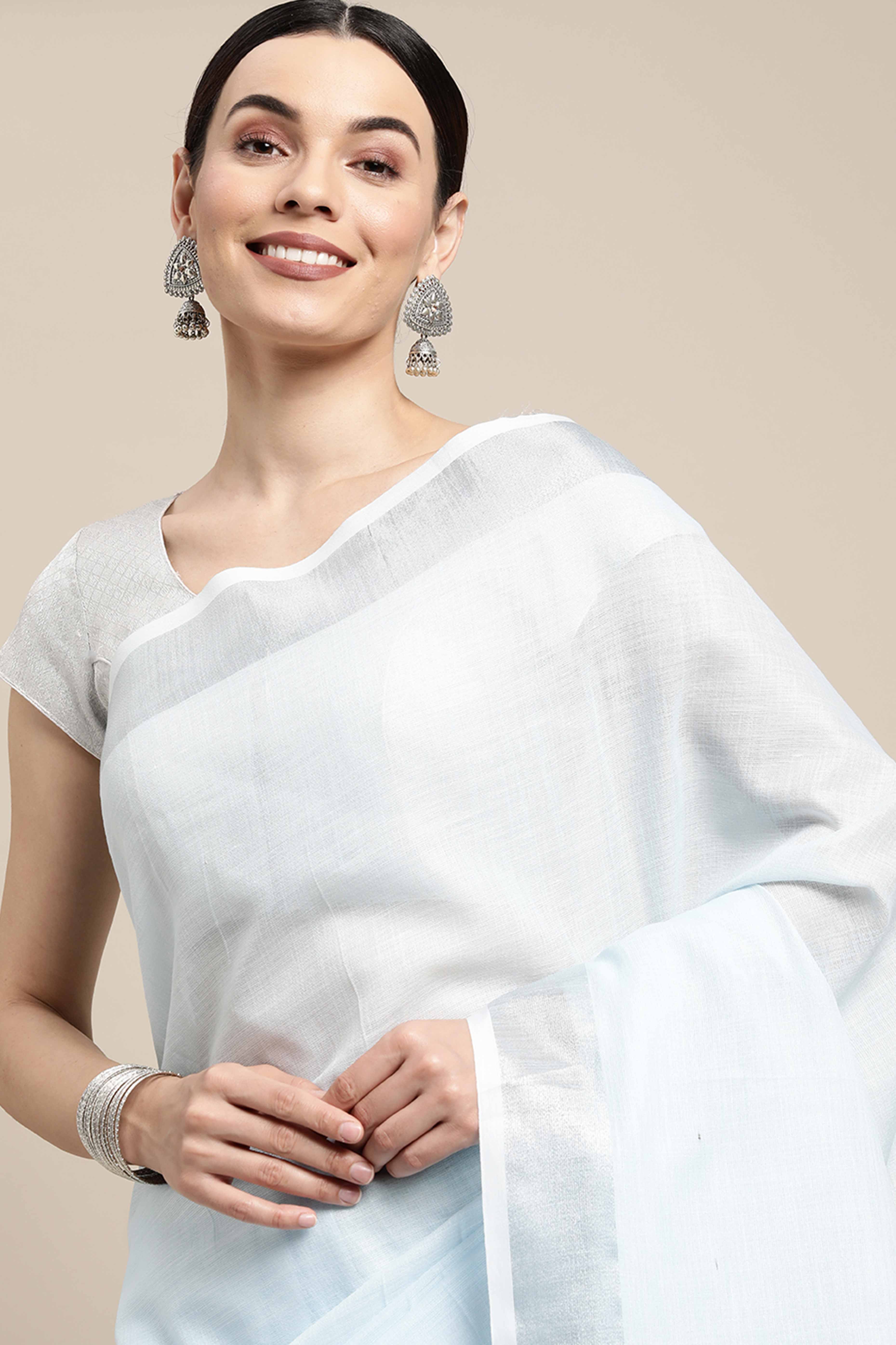 Light Sky Blue Linen Saree Adorned With Silver Zari Weaving Border & Pallu