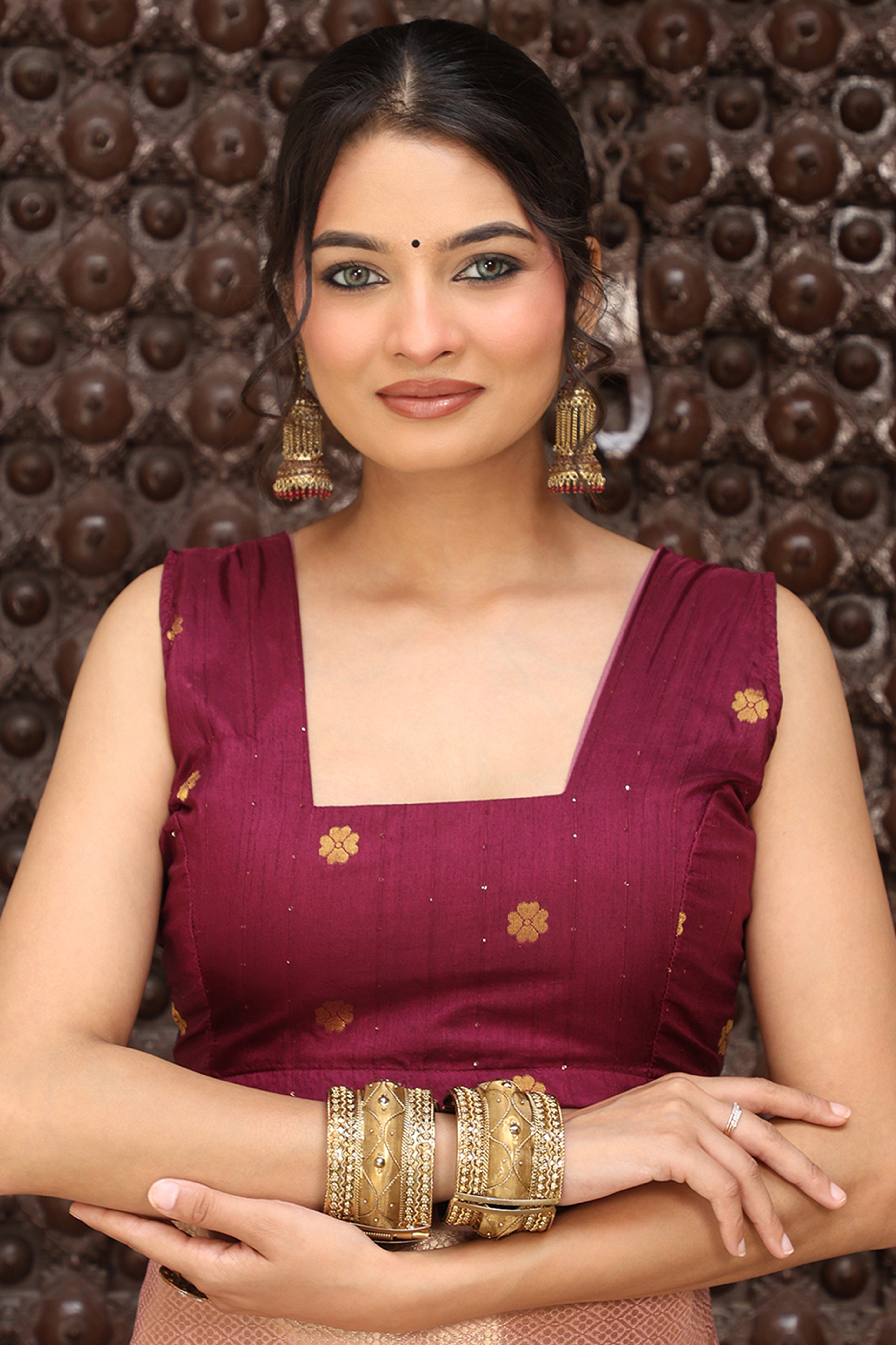 Trendy Pink Cotton Blend Saree Showcasing Elegant Zari Weaving & Tassel Border Pallu