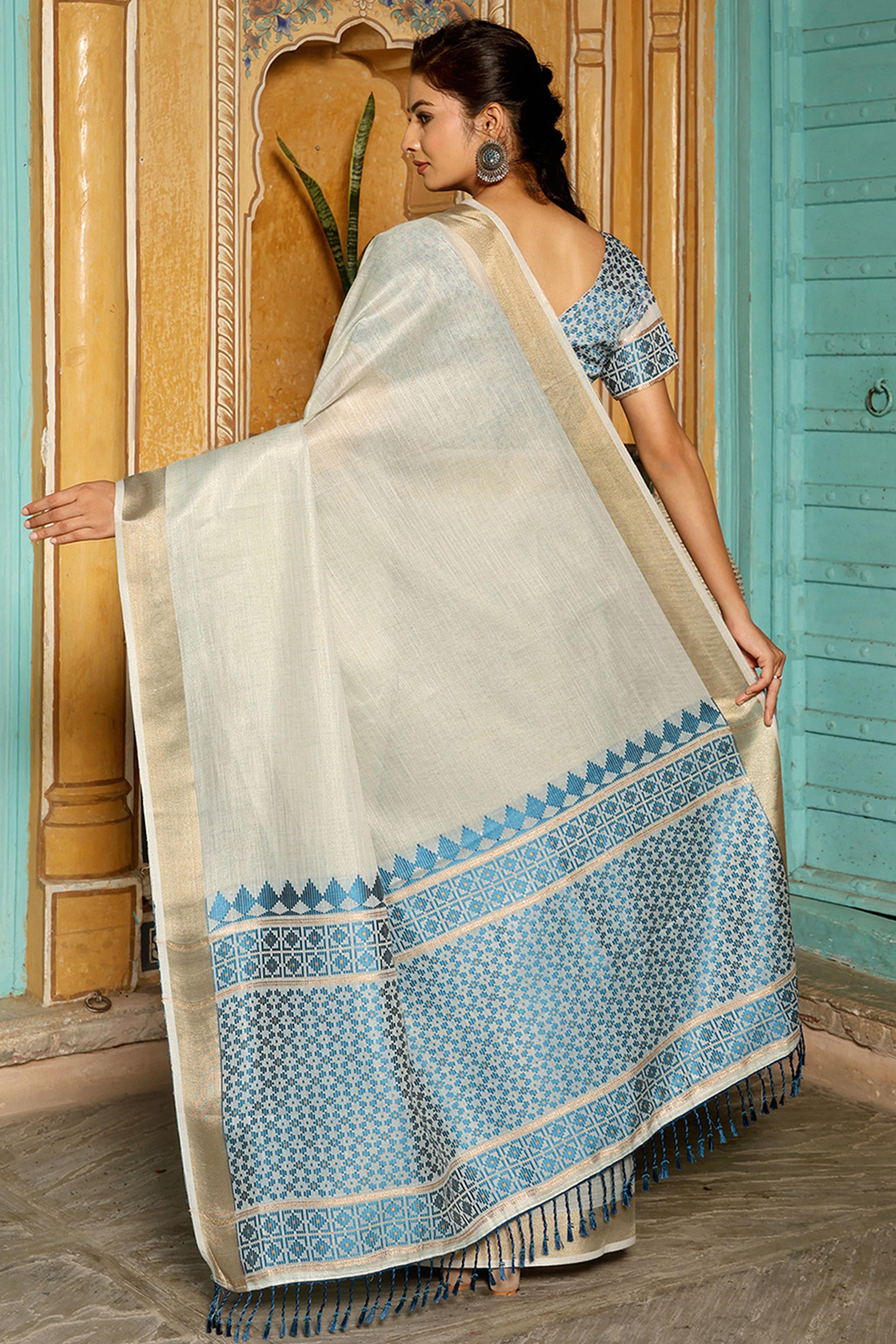 Minimalist Cream Linen Saree with Elegant Blue Pallu in Handloom Weave Look