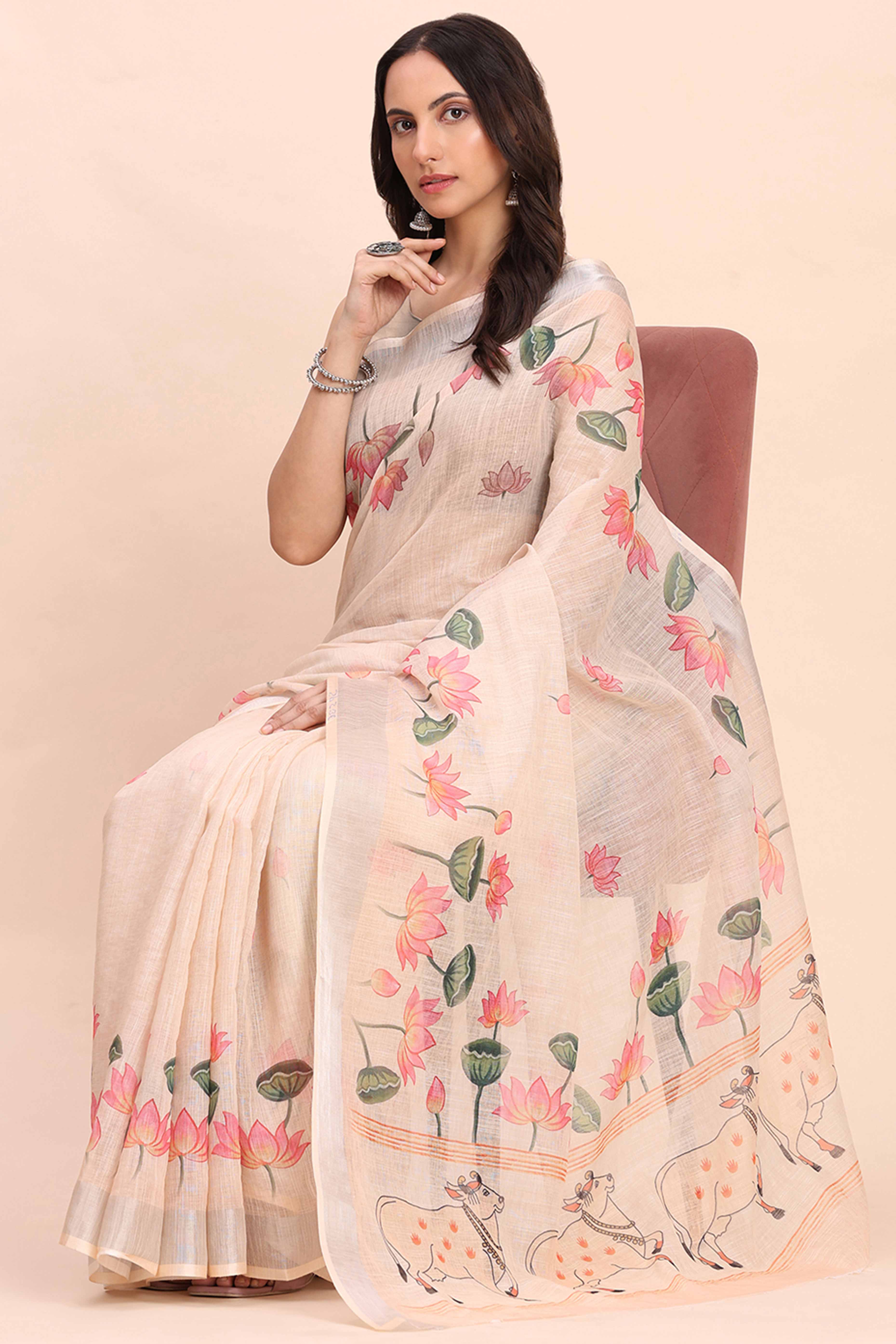 Beige Linen Cotton Saree Featuring Floral Prints & Woven Border